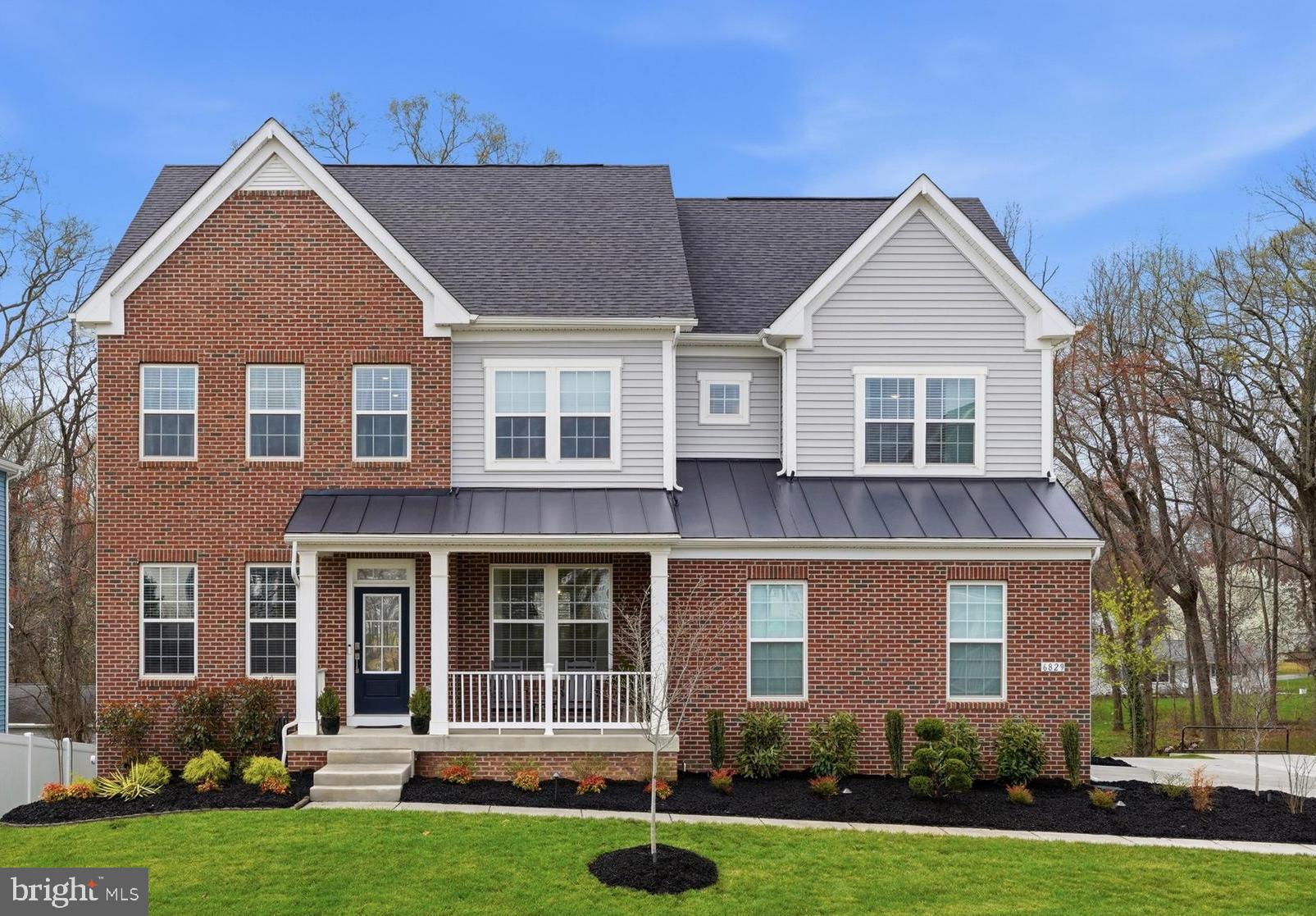 Built just two years ago and thoughtfully enhanced beyond the original build, this exceptional residence offers approximately 5,700 square feet of beautifully living space, combining modern design with extensive, high-end upgrades throughout.

Striking curb appeal welcomes you home, highlighted by professionally designed landscaping, a manicured lawn, and over $10,000 in exterior enhancements that elevate the home’s presence from the moment you arrive. Inside, more than $269,000 in design center upgrades transform every level, from the expansive open-concept main floor to the meticulously finished lower level.

The gourmet kitchen anchors the heart of the home, featuring an oversized island, premium cabinetry, and seamless flow into the main living and dining areas—ideal for both everyday living and effortless entertaining. Step outside to a screened-in covered deck and additional outdoor living spaces, offering multiple areas to relax or host gatherings while enjoying the outdoors.

A main-level bedroom with a private en-suite bath provides flexible living options, perfect for guests, extended family, or multi-generational living.

Upstairs, generously sized secondary bedrooms and a versatile loft offer adaptable spaces for work, play, or relaxation. The primary suite serves as a private retreat, boasting impressive proportions and a well-appointed spa-like bathroom.

The fully finished lower level further expands the home’s living space, featuring a large recreation area, media room, full bathroom, and the potential for a sixth bedroom—delivering both immediate functionality and long-term versatility.

With five bedrooms, five full bathrooms, and one half bath, this meticulously maintained home stands apart from newer construction by offering significant upgrades already in place. This is a rare opportunity to own a truly move-in-ready residence with exceptional design, thoughtful enhancements, and lasting value throughout.