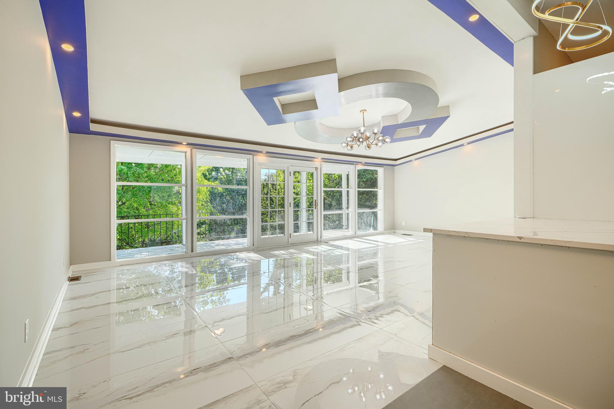 Rarely Available Rancleigh Rancher — Fully Remodeled | 2,300+ SF of Exceptional Living Space
Welcome to this stunning fully remodeled rancher in the highly sought-after Rancleigh neighborhood. With over 2,300 square feet of beautifully updated living space, this home combines modern luxury, functionality, and incredible flexibility.
Step into a bright and elegant main level featuring a stunning custom ceiling design and gorgeous ceramic tile flooring throughout the living room, dining room, and kitchen. The designer kitchen is a true showstopper with white glossy cabinetry, granite countertops, a large center island, 2 sinks, 2 dishwashers, and brand-new stainless steel appliances — perfect for entertaining and everyday living.
The home offers 4 spacious bedrooms with luxury vinyl plank flooring throughout, including a generous primary suite with a huge spa-like en-suite bathroom finished in luxury ceramic tile. A beautifully updated second full bathroom completes the main level.
The fully finished basement adds incredible versatility with its own kitchen and full bathroom already in place, plus potential for 2 additional bedrooms. Ideal for an in-law suite, guest quarters, extended living space, or Pesach kitchen setup.
Enjoy year-round comfort with 2 HVAC systems for zoned heating and cooling. Outside, relax on the welcoming front porch or enjoy the spacious backyard and rear porch — perfect for gatherings and outdoor enjoyment.
Bonus features include a driveway with carport, ample storage space, and so much more.
This is a rare opportunity to own a move-in-ready home in one of the area’s most desirable neighborhoods.