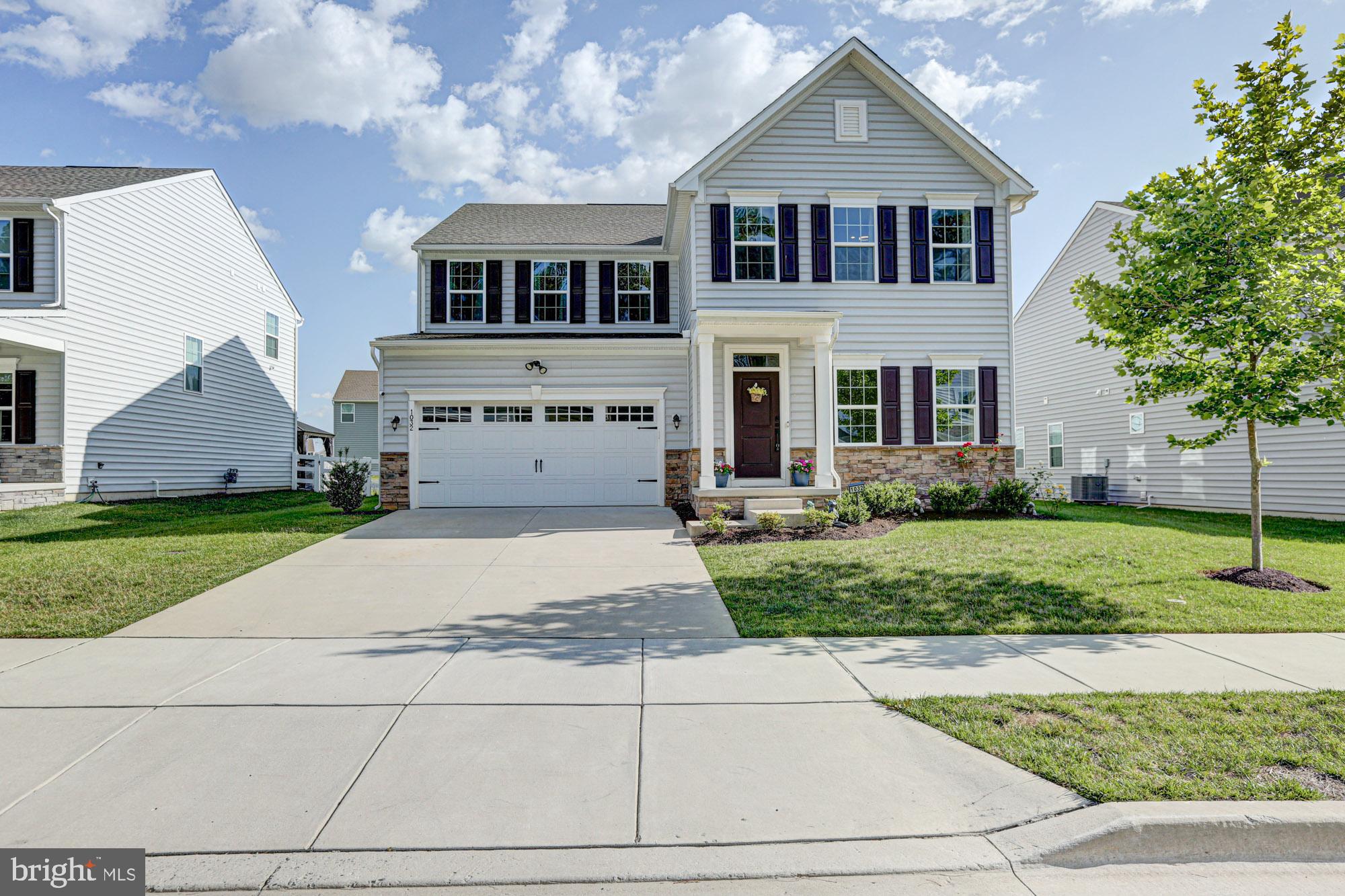Welcome to 1032 Applecross Drive, an exceptional opportunity in the sought-after Preserve at Deep Creek community of Middletown. Built in 2022 and offering an impressive 4,450 square feet of finished living space, this stunning home delivers the size, layout, and modern finishes today's buyers are searching for with an incredible 6 bedrooms and 5 full bathrooms rarely found at this price point. From the moment you arrive, the home's curb appeal makes a lasting impression. Beautiful stone accents, attractive landscaping, and a two-car garage create a welcoming exterior that perfectly complements the spacious interior beyond. Step inside to find fresh paint and luxury vinyl plank flooring spanning the main level. Just off the foyer, a private main-floor bedroom suite provides the perfect setup for guests, multi-generational living, or a home office, complete with a walk-in closet and attached full bathroom that also offers convenient hallway access. Continue down the hall to the formal dining room before arriving at the heart of the home, a sprawling family room filled with natural light from oversized windows and seamlessly connected to the stunning open-concept kitchen. Designed for both everyday living and entertaining, the kitchen features crisp white cabinetry, quartz countertops, tile backsplash, upgraded appliances, and an enormous center island that anchors the space beautifully. Beyond the kitchen, a newly added butler's pantry and prep area, expansive walk-in pantry, and nearby coat closet create the kind of functionality that busy households dream of. Upstairs, a spacious loft provides a second gathering area perfect for movie nights, play space, or a home office. The convenience continues with second-floor laundry. The luxurious primary suite serves as a true retreat, offering two walk-in closets and a spa-inspired bathroom complete with dual vanities, a beautifully tiled walk-in shower with bench seating, and a private water closet. An additional bedroom suite enjoys its own walk-in closet and private full bathroom, while two more generously sized bedrooms share a well-appointed hall bath. The finished basement expands the home's versatility even further, featuring a massive recreation area, dedicated fitness space, sixth bedroom with egress window and closet, and an additional full bathroom with walk-in shower. Unfinished storage and utility space provide the perfect balance of finished living area and practical functionality. Life at Preserve at Deep Creek offers more than just a beautiful home. Residents enjoy access to community amenities including open green space, lawn care and landscaping services, and planned recreational amenities such as a clubhouse, fitness center, swimming pool, sports courts, and playground areas. The community is also conveniently located across from Charles Price Memorial Park and offers easy access to major commuter routes. Location is everything, and this home delivers. Situated in the heart of Middletown, you're just minutes from local favorites including Middletown Main Street, Silver Lake Park, Charles Price Memorial Park, The Everett Theatre, Dutch Country Farmers Market, and countless shopping and dining destinations. Commuting is a breeze with quick access to Route 1, Route 301, and Route 896, providing easy travel to Wilmington, Newark, Dover, and beyond. With 6 bedrooms, 5 full bathrooms, over 4,450 square feet of living space, modern construction completed in 2022, and an unbeatable combination of size, functionality, and location, opportunities like this don't come along often. If you've been waiting for a home that truly has room for everyone and everything, this is the one. Schedule your private tour today before another buyer takes advantage of the incredible value this exceptional home has to offer.