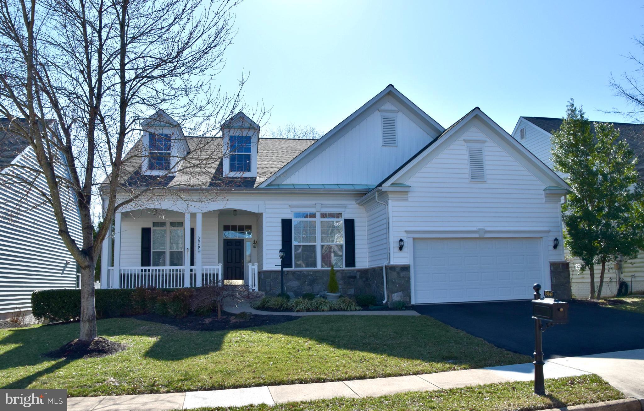 A Rare Gem in Dunbarton! ✨ This stunning 3-bedroom home sits on one of the best lots in Dunbarton, backing to serene woods and wildlife for ultimate privacy and tranquility. Step inside to find gorgeous wide-plank hardwood floors on the main level and where the large primary suite offers a peaceful retreat. With plantation shutters, ceiling fan, walk-in closet, and a spa-like ensuite featuring a frameless glass shower, double vanity, and a soaking tub. All of this in Dunbarton’s amenity-rich, active adult community.  As you continue to walk the home, you will see a beautiful family room with views of the composite deck and woods. From here you will see the oversized dining room which can be converted into another bedroom if one wished to do so. The kitchen has granite countertops, backsplash, new stainless steel appliances, center island, upgraded cabinets, eating area, and morning room with a gas fireplace. You can access the deck from here as well as from the family room. Plantation shutters and recessed lighting throughout. From the two car garage, you access the mud room and main level laundry. You then have the hall full bath and secondary bedroom.  The fully finished basement offers exceptional versatility, featuring durable LVP flooring throughout and ample storage space.  A spacious rec. room with walk-out access leads to the fenced, park-like backyard, perfect for relaxation or entertaining. The lower level also includes a large den ideal for a home gym, full bathroom, private home office, an expansive third bedroom or media room—offering endless possibilities to fit your lifestyle.  And with a new roof, this home is truly move-in ready! Come see it in person to appreciate all it has to offer! Don’t miss this incredible opportunity!
