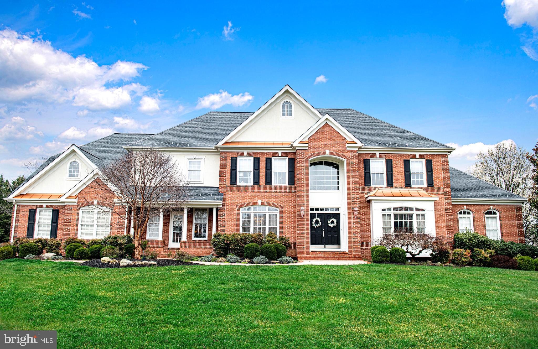 This impeccably designed home in Willow Chase, with its beautiful architecture and impressive design is sure to impress your most discerning buyer.  Boasting over 7900 square feet, this stunning home has been updated with top notch finishes and  features 5 bedrooms, 4 full bathrooms and 2 half baths.  A grand foyer, gleaming hardwood floors and a beautiful staircase sets the tone for elegance as you enter this home through double doors.  A beautiful conservatory surrounded by windows is a wonderful addition to this home and serves as the perfect study. A sun drenched family room with soaring ceilings awaits quality time with family and friends while gathering around a beautiful fireplace. The custom designed kitchen is a chef’s dream and features a breakfast bar and an exceptional butler’s pantry with its own dishwasher. Indulge in culinary delights with a Wolfe cooktop,  Subzero refrigerator, double Wolfe ovens,  two Bosch dishwashers and two Rohl sinks, both with InSinkErators. Granite countertops add to the beauty of this kitchen. The mudroom has its own entrance and includes a beautiful built in, adding an attractive and useful space. Ascend to the upper level by a convenient back staircase to 4 very spacious bedrooms and 3 full baths. The primary bedroom is the perfect sanctuary, where you will find a cozy sitting room adorned with a gas fireplace. A new luxurious bath offers opulence with marble countertops, state of the art shower, free standing tub, custom cabinetry and a heated floor. The lower level of this home offers another retreat of its own. Featuring a magnificent custom bar, this just might become your favorite place to entertain friends and colleagues. A game area, comfortable sitting area, a fifth bedroom with full bath, workshop and storage area complete this level. Outdoor living is inviting with a beautiful deck and a very spacious fenced in backyard.  Updates include new roof, new HVAC'S, newer custom kitchen, new owner's suite bath and refinished floors. This incredible home even comes with a whole house generator for peace of mind.  WELCOME HOME!