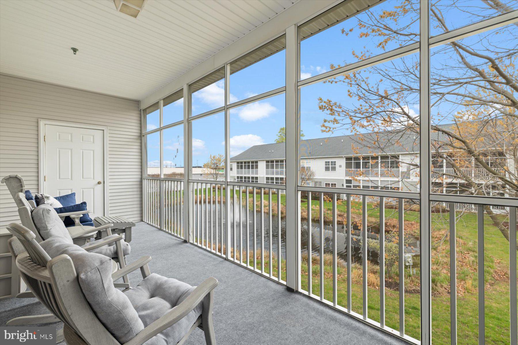 2026  HOA DUES TO BE PAID BY SELLER  WITH ACCEPTABLE OFFER!  Just in Time for Summer – Prime Investment Opportunity & Coastal Retreat East of Route 1!

Welcome to this beautifully remodeled 3-bedroom, 2-bathroom top-floor end-unit condo—an exceptional opportunity for those seeking a highly desirable nightly rental or the perfect personal beach getaway. With no rental minimums, this property is ideally positioned to maximize summer income while offering guests the ultimate Lewes experience.

Bathed in natural light and surrounded by tranquil pond views, the open-concept layout has been thoughtfully updated to impress today’s renters and homeowners alike. The brand-new kitchen is a standout feature, showcasing quartz countertops, stainless steel smart appliances, shiplap accents, soft-close cabinetry, subway tile backsplash, and under-cabinet lighting. An oversized eat-in island creates the perfect gathering space—ideal for entertaining guests or hosting vacationers.

The spacious living area exudes coastal charm with commercial-grade LVP flooring, stylish Visual Comfort Maverick designer fans, and sliding doors that lead to an oversized screened porch—perfect for relaxing after a day at the beach or enjoying peaceful mornings overlooking the water.

The primary suite offers a private retreat with a walk-in closet and en suite bath featuring a step-in shower. Two additional bedrooms provide ample space for guests or renters, while the full-size laundry room with new front-load washer and dryer adds everyday convenience. Abundant storage throughout enhances both comfort and functionality.

What truly sets this property apart is its unbeatable walkability and location. Guests and owners alike will love being just steps from some of Lewes’ most popular dining and entertainment spots, including Crooked Hammock Brewery, Bethany Blues, Bushels Crab House, and Midway shopping. Bike to the beach, explore nearby state parks and scenic trails, or enjoy everything this vibrant coastal town has to offer—without ever needing to get in the car.

Whether you’re looking to generate strong short-term rental income during peak summer months or secure your own turnkey coastal escape, this move-in ready condo checks every box.

Don’t miss this rare opportunity to own a top-floor gem in one of Lewes’ most convenient and rental-friendly locations!