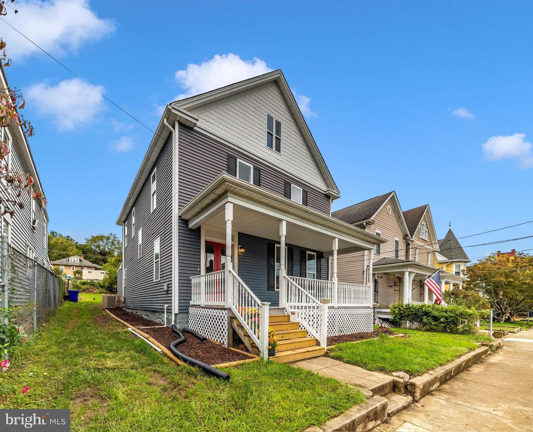 *Open house 10/27 CANCELED*  Great value here! Beautiful home in downtown Brunswick featuring many updates top to bottom, inside and out, in addition to some fantastic restored original features! These high ceilings, refinished hardwood floors, classic woodwork, and polished original hardware will WOW you! Featuring replacement windows, vinyl siding, newer roof, dual HVAC systems (serviced in Aug 2024) and tankless water heater.  The NEW kitchen has space for eat-in and features new SS appliances, tall cabinetry with crown molding, and soft close drawers. The fully updated bathroom on the upper-level features beautiful ceramic tile. The large front porch is perfect for relaxing with a cup of coffee. This home is situated on a large lot with off-street parking for 4+ vehicles with the possibility of adding a garage or carport if desired. Just a short walk to the NEW elementary school, shopping, restaurants, and commuter MARC train station. Walk-up attic has great potential for additional finished space or storage. Professional basement waterproofing completed with transferrable lifetime warranty for peace of mind! Nothing to do but move in! This home is UDSA eligible!!