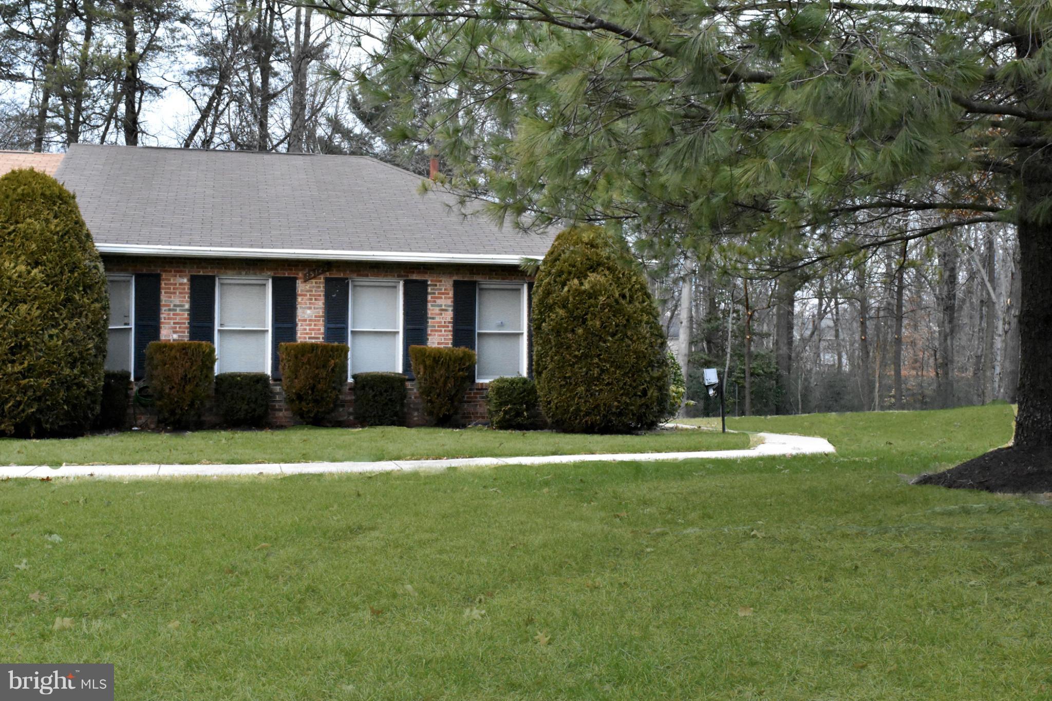 Spacious end unit townhouse on nice lot. Backs to trees and park with tennis court. Lots of natural light. 2 large bedrooms & 2 baths on main level. Shows like a detached home with private entrance. Natural gas heat. The unfinished basement is ready for your plans. Awesome opportunity to purchase and renovate as desired. contract quote for  complete remodel @   $21,000.  Convenient to I-95.
