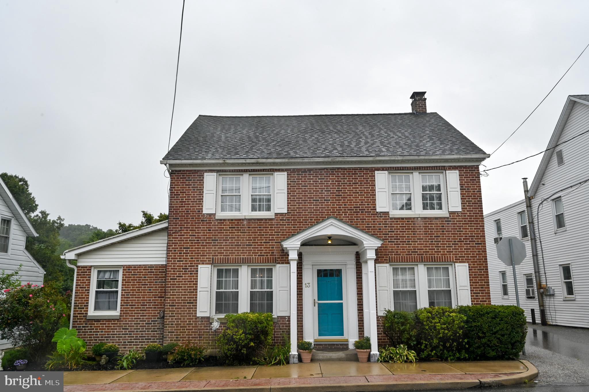Charming Brick  2150 sf colonial in Spring Grove Area school district.  4 bedrooms with large closets and 2 full baths, including a first floor bed and full bath. The main level also has a formal  dining room with beautiful ceiling to floor built in corner hutch, large living room with exposed staircase, a n office/family room,  2 mudrooms, and the laundry room. Upstairs you will find 3 additional bedrooms including a bedroom with a bonus room and outdoor balcony, and the 2nd full bathroom. The home has great outdoor space as well with a brick paver patio, beautiful gardens and landscaping, and a garden swing. The over sized garage/shop was once a 3 car garage that they turned into a 1 car garage with large shop area attached, The lot is .27 acres and is a corner lot. This home has been lovingly maintained and has character and charm that you would expect in an early 1900s home with so many modern conveniences including central air and an updated kitchen. Located in Jefferson Borough and Spring Grove Schools yet convenient to 83, Hanover, West York, and Carroll County MD. Don't miss this charming and spacious home, it won't last long !! A unique historical fact,  the office and residence of the town doctor from 1931-1990.