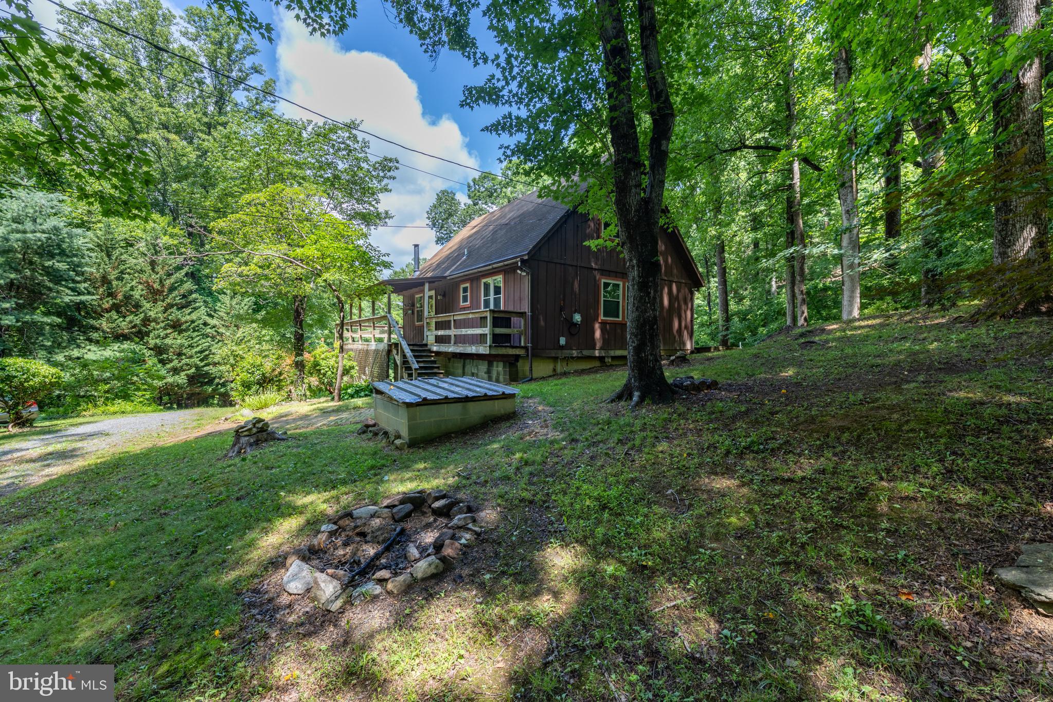 Middle River Retreat Cabin – Two Extra Lots & Welding Workshop Included

Enjoy the peace and beauty of Middle River Retreat with this charming cabin getaway. Surrounded by nature and abundant wildlife, this property offers a relaxing mountain retreat. Included are two additional lots for added privacy or future possibilities, plus a spacious welding workshop for hobbies, storage, or projects. Circle driveway for easy access. Whether you're seeking a weekend escape or year-round enjoyment, this unique property is ready to welcome you home.
Community amenities include a nearby lake and picnic area. Being sold AS-IS Priced to sell just above county assessment.