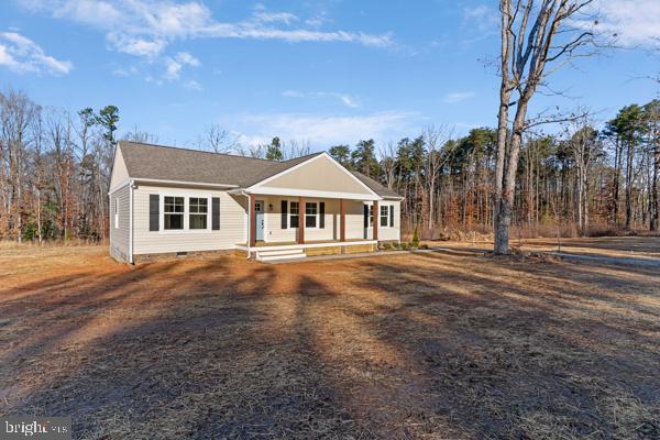 Brand New Home Just Completed!! This 3-bedroom, 2 full bath gem features an open concept layout perfect for the family. The updated kitchen offers stylish finishes, and the 2-car garage provides convivence and storage.  Relax on your front country porch or unwind on the back deck overlooking a spacious backyard, ideal for family gatherings. Located just minutes from Lake Anna and local Restaurants. Don't miss out on this amazing opportunity!