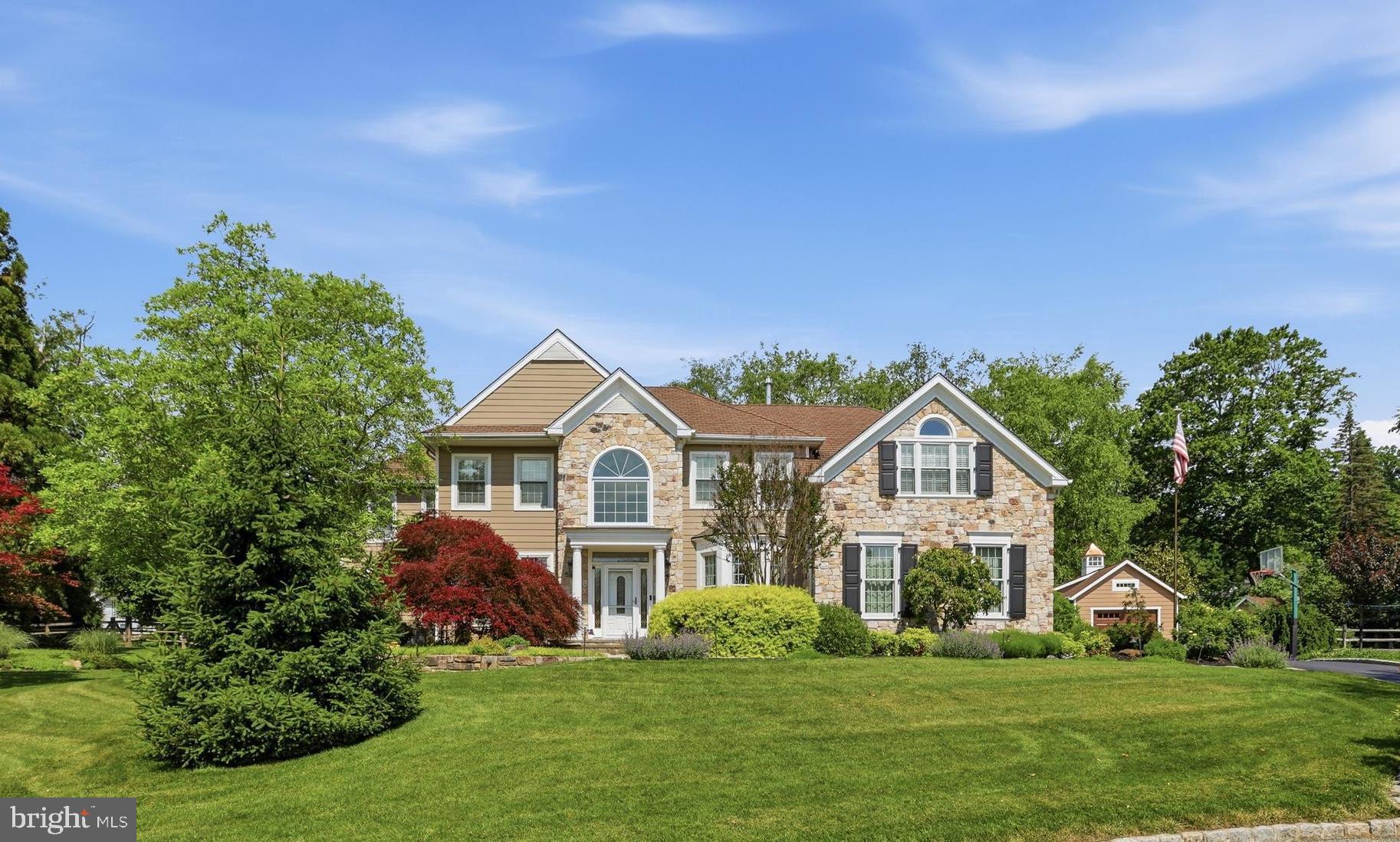 Nestled on a picturesque, tree-lined cul-de-sac in the highly sought-after Waterford community,
this exceptional estate showcases the finest materials and impeccable attention to detail
throughout more than 6800 square feet of beautifully crafted living space. From the moment
you arrive, the home makes a lasting impression with its stone-apron driveway, mahogany
garage doors, stone entry walk and award-worthy landscaping illuminated by elegant exterior
lighting. Step into the grand two-story foyer, where natural light pours in and sets the tone for
both the refined living room and formal dining room. A sophisticated butler’s bar with wine
fridge leads seamlessly into the heart of the home—an extraordinary chef’s kitchen featuring
custom cabinetry, tile backsplash, a Dacor 6-burner gas cooktop, Sub-Zero refrigerator, Miele
dishwasher and stunning granite countertops and multiple islands designed for both function
and gathering. The adjacent casual dining area with two-story gas fireplace flows into the
great room addition, which has multiple seating areas and a cozy wood-burning fireplace.
Here, coffered ceilings, custom millwork and a dramatic wall of windows create breathtaking
sightlines and abundant natural light, overlooking the lush backyard and flagstone patio with
grilling area. A private first-floor office offers both sophistication and comfort, with a cathedral
ceiling, built-in cabinets and shelves, a window seat with storage, and space for two
desks—ideal for working from home. A second side patio with pergola is just outside the office,
and nearby powder room and second staircase provide added convenience. Upstairs the
primary bedroom suite has 3 spacious closets with custom shelving, with an en-suite bathroom
featuring Carrera marble, a glass shower and modern free-standing tub. Down the hall and
connected by an open loft overlooking the main level, a second primary suite includes a
spacious walk-in closet, custom shelving with desk, sitting area, and beautifully appointed
bathroom. Two additional bedrooms, an additional full bath with stylish tile and quartzite, and a
generously sized custom laundry room complete the second floor. The finished lower level
offers exceptional versatility, with a fitness room, billiards area, ping-pong room, entertainment
space, and an additional powder room—perfect for hosting or relaxing. Outdoors, the stone
patio features a Struxure motorized pergola that provides shade and comfort all day, with a 24-
foot motorized sun shade for privacy, two ceiling fans, and built-in lighting for entertaining in
the evening. The fenced yard has stunning landscaping, surrounded by mature trees and
privacy hedge, as well as a storage shed in the rear of the yard. In addition to the 2-car
garage, an additional detached oversized garage contains a workshop and is wired for EV
charging, beautiful Hardie Siding (2020) and Custom Extensive Hardscape and  Longwood gardens worthy  perrenials.  
Ideally situated just minutes from East Goshen Park, Malvern Prep, premier private schools, and award-winning public schools, this exceptional home offers an unmatched lifestyle. Enjoy easy access to upscale dining, boutique shopping, local golf and country clubs, tennis courts, pickleball facilities, and countless recreational opportunities.



Commuters will appreciate being just minutes from the Paoli and Malvern train stations, providing direct service to Philadelphia, New York City,  and Washington, D.C. The property is also conveniently located approximately 25 minutes from Philadelphia International Airport and close to Paoli Hospital.
Golf enthusiasts will love the proximity to some of the region’s most prestigious clubs, including the renowned Aronimink Golf Club, recent host of a PGA Tour event.
Experience the perfect blend of luxury, convenience, recreation, and accessibility in one of Chester County’s most desirable locations. Welcome Home!