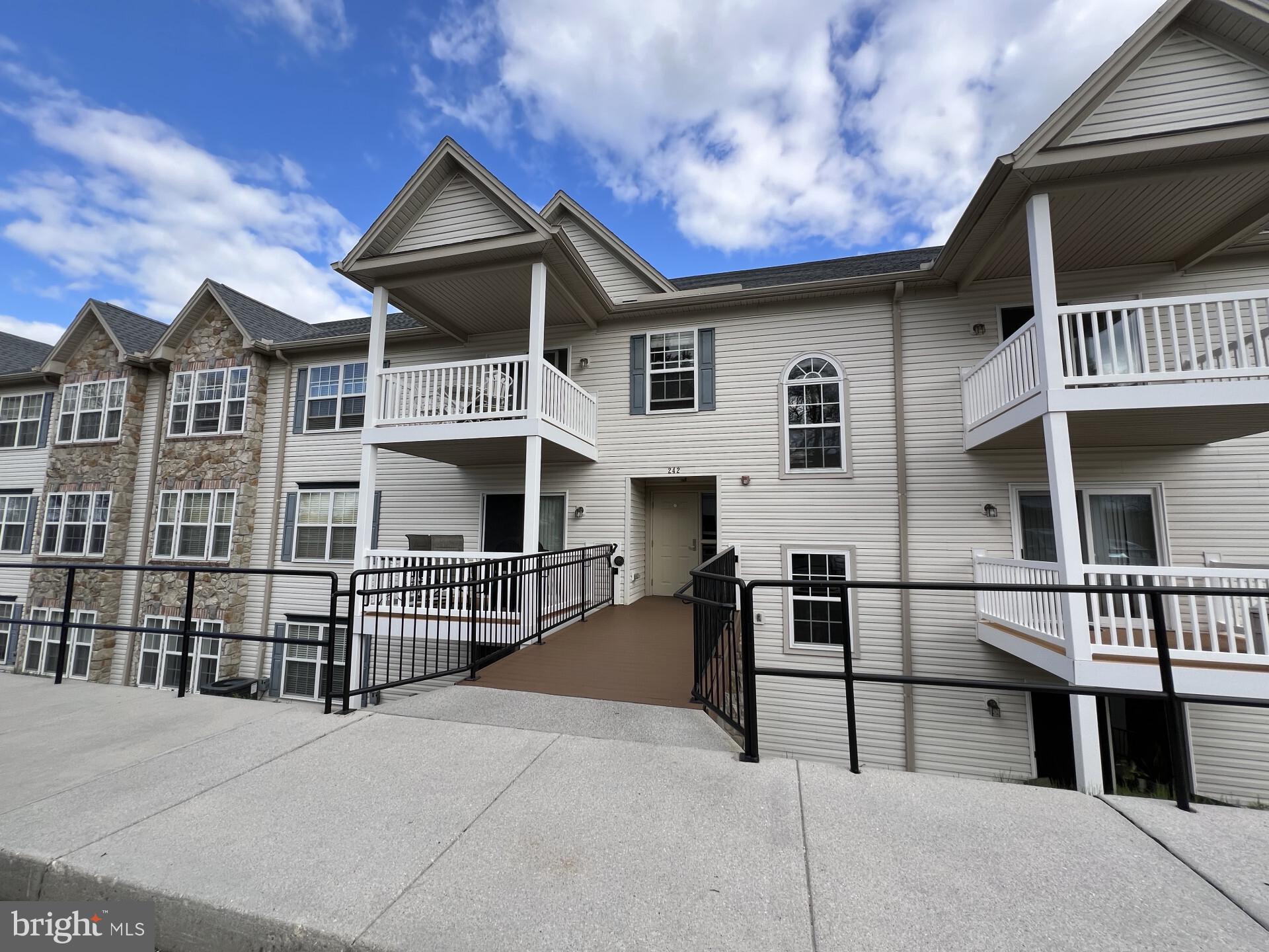 Welcome to this recently updated 2 bedroom 2 full bath condo at 242 J North Second Street in the New Freedom View condominiums.  It offers extra space in the main living room, is recently renovated with fresh paint and new plank flooring throughout and is close to many New Freedom amenities.  Both bedrooms are spacious with the primary bedroom offering a large walk-in closet and private bath.  The kitchen has solid surface countertops, plenty of cabinet space, and all appliances are included. In less than 5 minutes, you can enjoy the Heritage Rail Trail, Vortex, Seven restaurant and other New Freedom shops, breweries and restaurants.  And it's just a 5 minute drive to Shrewsbury, offering multiple shops and grocery stores, additional restaurants, and interstate 83.  The building is quiet and secure, requiring a key code to enter.  The condo also has a utility/laundry room with washer and dryer included.  Furnishings can be included.  There is plenty of parking in front of the building.