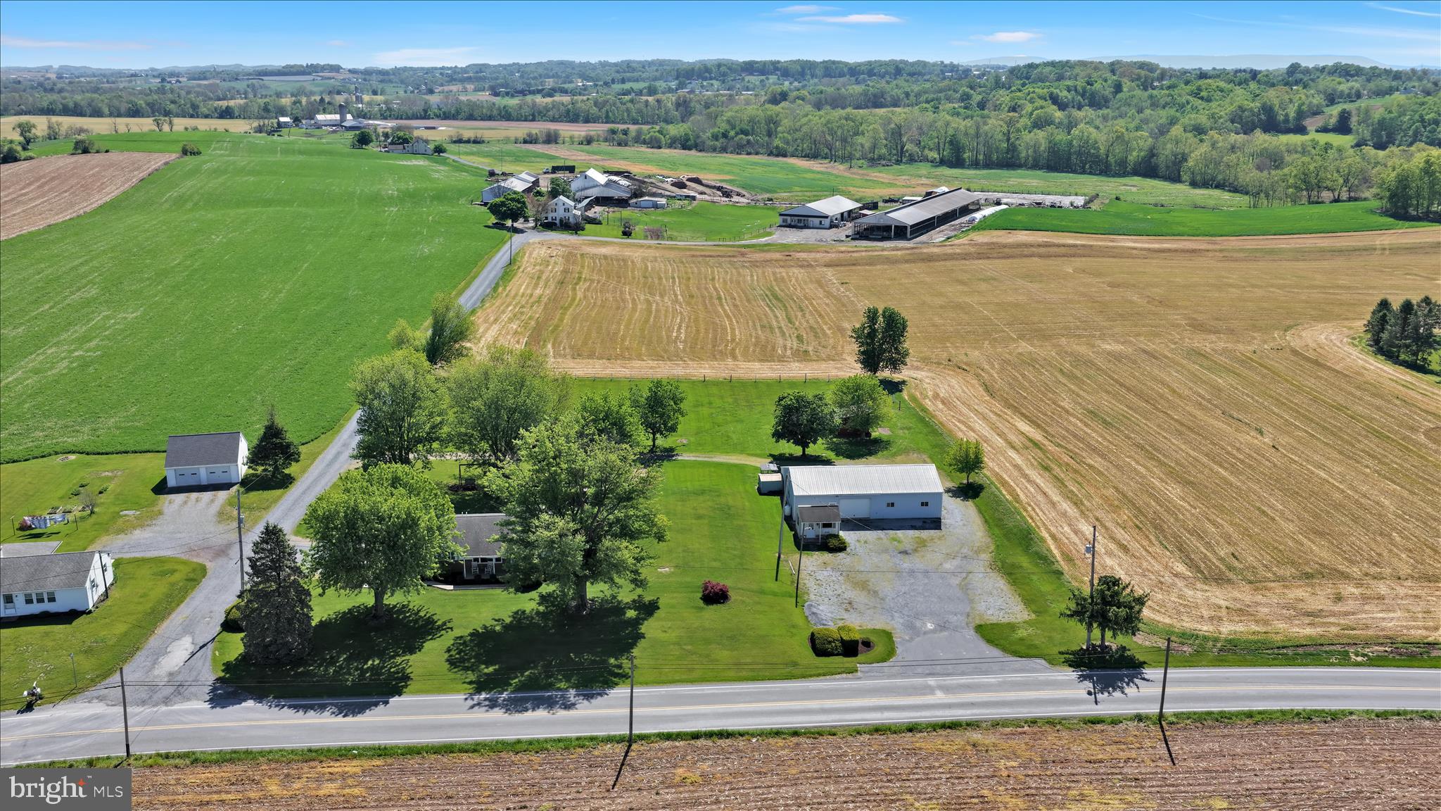 Public Auction Friday, June 19, 2026, 5 pm. Open House Saturday, May 30 & June 6 from 1-3 pm. Buyer required a 10% non-refundable deposit. Settlement within 45 days. Buyer pays the 2% RE Transfer tax. List price does not reflect the final sales price. *Country Ranch Home w/Large Shop on 2.02 Acres. in Mt. Zion/Hamlin Area. Features 1824 SF Living Area on main floor w/open floor plan. Eat-in Kitchen open to a spacious LR, Lg entrance to office /sewing room adjacent to Kitchen. Laundry/Mudroom. One end of the house has 2 BRs & 1½ BA & the other end offers In-Law Quarters w/kitchenette, Sitting Area, BR & BA. Partially finished full Basement with 1045 SF Living Area with sink, Lg Sitting Area, 2 BRs, Coal stove. Inside & Outside Entrance, CA, 42×54 Shop w/elect heat. 2 Overhead Doors, Lg Parking Area. This delightful Country setting offers a home with a total of 2869 SF Living Area, Lg shop on a level 2 acres surrounded by farmland. Check with zoning to see what businesses are permitted. Conveniently located between I-78 & Rt. 422.
