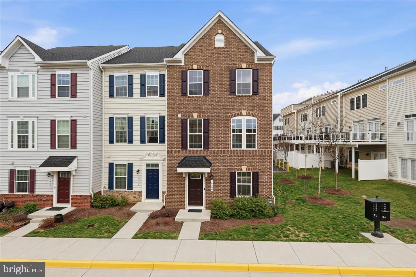 Welcome to 24594 Laurel Lake Terrace, a stunning end-unit Ryan Homes Strauss model located in the highly sought-after Arcola Town Center community. Built in 2020 and featuring over $75,000 in upgrades, this brick-front townhome offers 4 bedrooms, 3.5 bathrooms, a 2-car garage, and nearly 2,200 square feet of thoughtfully designed living space.

As an end unit, this home enjoys abundant natural light throughout the day and sits on a spacious 2,178-square-foot lot. The entry level features a versatile fourth bedroom with a full bath, ideal for guests, a home office, or a fitness room. The main level showcases an open-concept floor plan with luxury vinyl plank flooring, oversized windows, and a chef-inspired kitchen featuring stainless steel appliances, upgraded cabinetry, granite countertops, a large center island, and a reverse osmosis water filtration system for purified drinking water. The spacious living and dining areas flow seamlessly to a large Trex deck, perfect for entertaining and outdoor enjoyment.

A custom wet bar with matching cabinetry and granite countertops adds additional entertaining space and functionality. Upstairs, the spacious primary suite offers custom closet shelving, a walk-in closet, and a luxurious en-suite bath with a soaking tub, double vanity, and separate shower. Two additional bedrooms, a full hall bath, and a convenient laundry area complete the upper level.

Notable upgrades include 14 solar panels installed in 2023, resulting in exceptional energy efficiency and potential $0 electric bills, a whole-home humidifier system, premium custom blinds, designer lighting, modern ceiling fans, recessed lighting, and an epoxy-coated garage floor for a clean and polished finish.

The HOA maintains the landscaping and Trex deck, providing a low-maintenance lifestyle. Conveniently located within walking distance to Walmart, Target, restaurants, and everyday shopping, and less than a mile from Dulles Landing, this home also offers easy access to Route 50, Route 606, the Dulles Toll Road, Silver Line Metro, and Dulles International Airport. Residents enjoy community amenities including a pool, clubhouse, playgrounds, tot lots, and scenic walking trails. Zoned for highly regarded Loudoun County schools, this exceptional home combines luxury, efficiency, convenience, and location in one outstanding package.

The biggest buyer-attracting features from the seller’s list are the 14 solar panels with virtually no electric bill, end-unit location, custom wet bar, RO water system, epoxy garage floor, and walkability to Walmart and Target, so I made sure those stand out in the description.