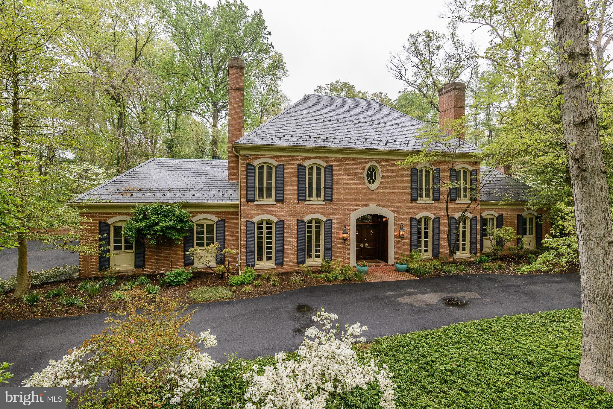 One of my most favorite houses in 30 years of selling! Classic, timeless, custom built, brick colo. w/exceptional curb appeal. Wonderful character & warmth, high ceilings, generously proportioned rm sizes, beautiful details--random width plank flring, a sweeping staircase, extensive moldings. Handsome Library, dramatic all-glass Conservatory. Spectacular 2 ac setting w/pool! Easy access to I-495
