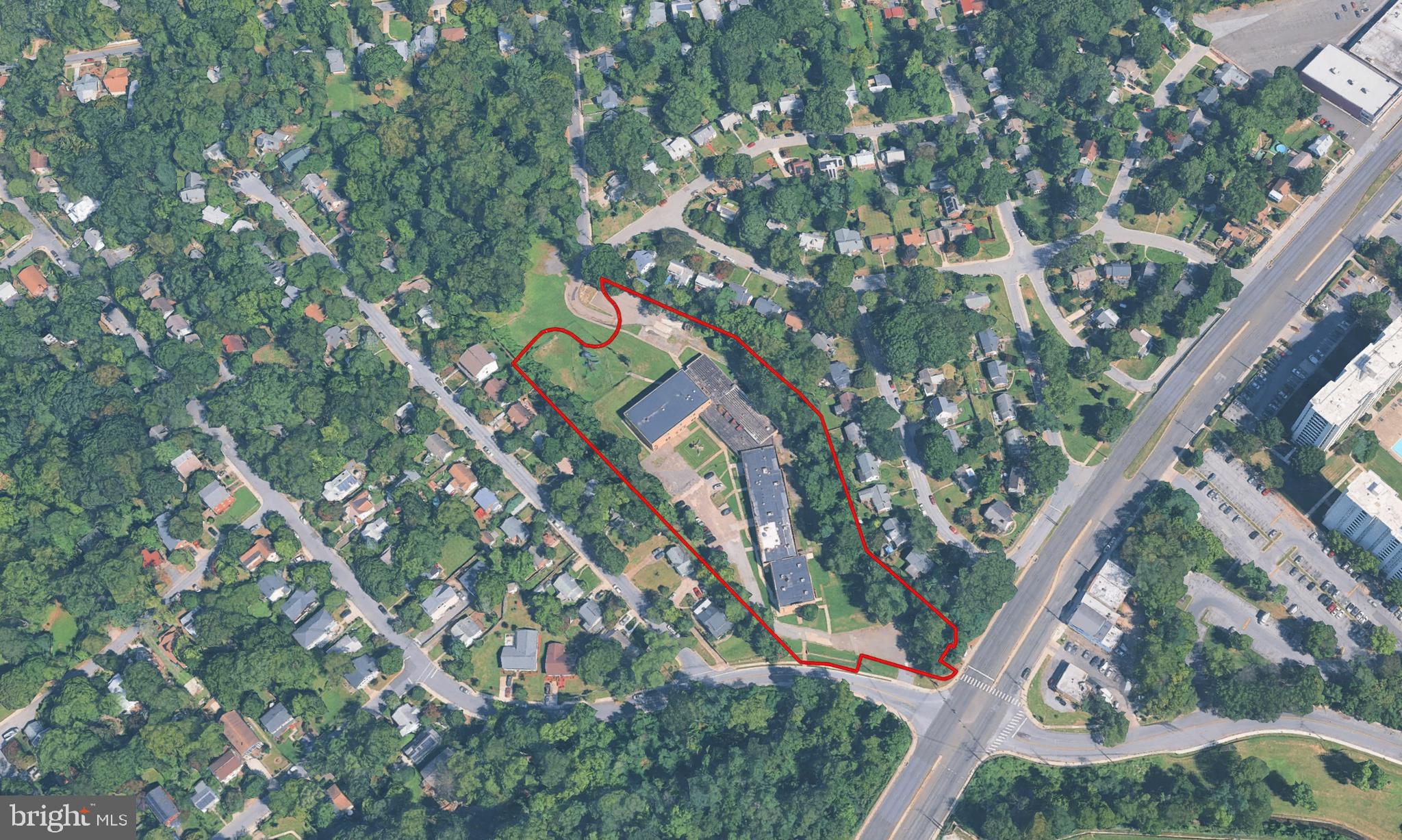 6501 Poplar Avenue presents a rare opportunity to acquire a 5.17-acre parcel in the heart of Takoma Park, just 0.5 miles from the Washington, DC border. Currently utilized as a senior daycare facility, the existing buildings have also been used as a school and apartments. While interior rehabilitation is needed, the property is one of the largest  parcels in the immediate area and is zoned R-60 (Single-Family Detached), offering significant long-term value for a developer evaluating subdivision, assemblage, or future entitlement strategies. 

With immediate proximity to Metro, major commuter routes, retail amenities, and highly regarded Montgomery County schools, this site combines scale, location, and zoning fundamentals that are increasingly difficult to replicate inside the Capital Beltway.

All information is compiled from sources deemed reliable. Buyers are encouraged to conduct their own independent due diligence, inspections, and consultations with professional advisors.