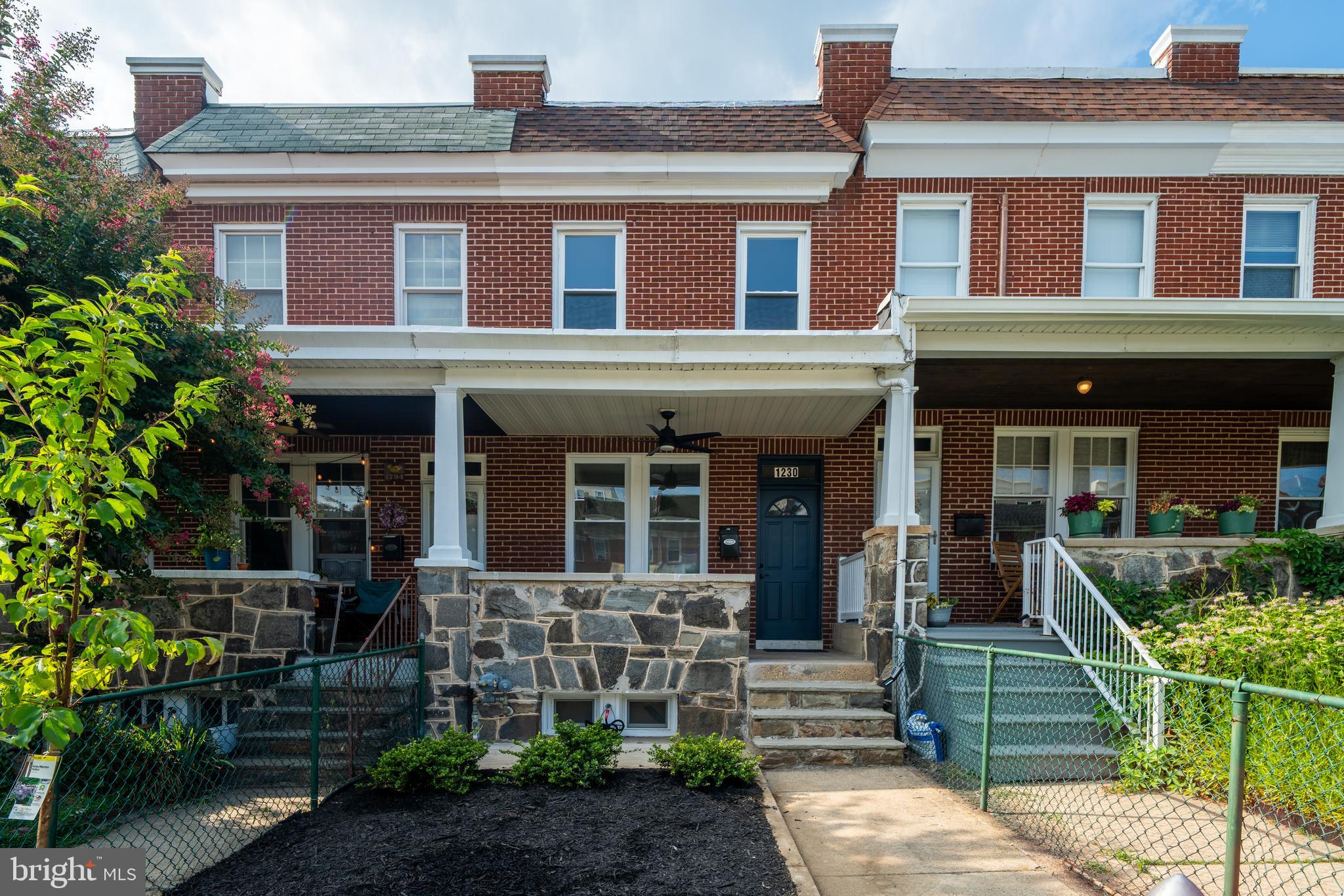 Everything New in 2026! Welcome to this stunning, fully renovated rowhome in the heart of Baltimore's highly sought-after Hampden neighborhood. Completely rebuilt from the inside out, this exceptional home combines historic charm with modern luxury and offers the peace of mind that comes with virtually every major component being brand new.

The extensive 2026 renovation includes a new roof, HVAC system, all-new ductwork, water heater, electrical wiring throughout, plumbing, energy-efficient windows and sliding glass door, interior and exterior doors, recessed lighting, luxury flooring, and fresh finishes throughout. Every detail has been thoughtfully selected to deliver quality craftsmanship, style, and years of low-maintenance living.
The designer kitchen is the centerpiece of the home, showcasing solid wood cabinetry, luxurious quartz countertops, a custom porcelain farmhouse sink, and brand-new Samsung stainless steel appliances ( including washer and dryer). Luxury vinyl plank flooring flows throughout the living spaces, creating a warm, elegant, and cohesive design.

The home features three beautifully renovated bathrooms, including two full baths (upper level and fully finished lower level) and a main-level powder room, all appointed with designer vanities, porcelain tile, and premium Delta fixtures.

The fully finished lower level adds valuable living space and offers endless possibilities as a family room, guest suite, home office, fitness area, or media room. Whether you're entertaining friends or simply relaxing at home, this flexible space adds exceptional functionality.

Located in a quiet Hamden neighborhood with easy street parking and steps from Hampden's famous The Avenue, you'll enjoy easy access to award-winning restaurants, local cafés, breweries, boutique shopping, parks, and neighborhood events. Downtown Baltimore, major commuter routes, universities, and area hospitals are all just minutes away, making this an ideal location for both work and play.

Luxury renovations completed to this standard are rarely available in Hampden. This is a true turnkey home where all the major updates have already been completed—simply move in and enjoy.

Schedule your private tour today and experience the exceptional quality, craftsmanship, and attention to detail that make this home truly stand apart.