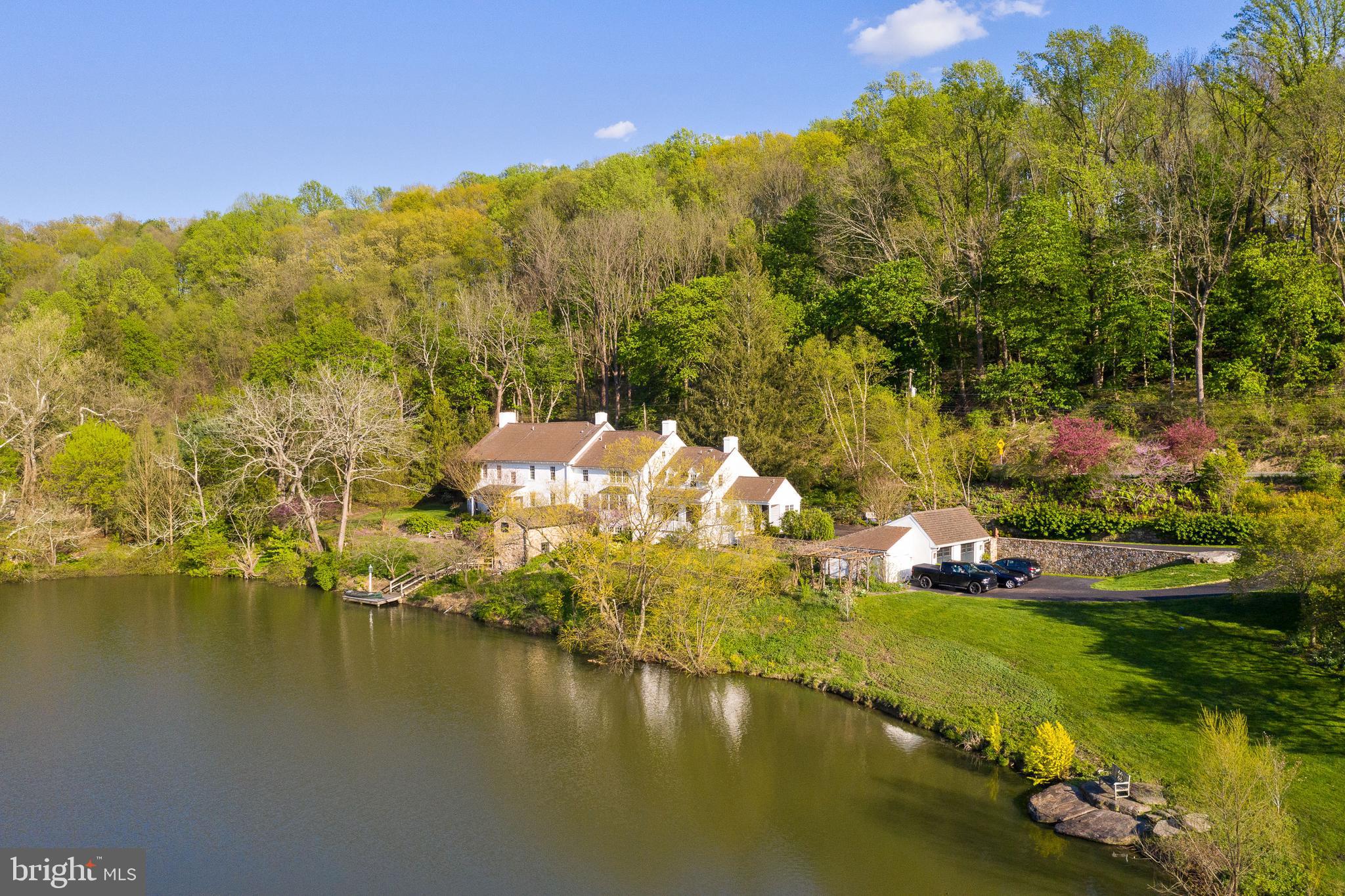 Welcome to 639 Church Rd in the heart of Charlestown Township. Being sold with six other parcels, equalling 75+ picturesque acres, this amazing estate offers incredible view sheds and the privacy that only a property of this caliber can offer. The historic and charming farmhouse with 5 bedrooms and 3.2 bathrooms was renovated and restored in the early 2000s by John Milner and Spencer-Abbott. This 2.5 year renovation was truly a work of love and meticulously blends the character of the home while modernizing it for every day living. Grand living spaces, multiple wood burning fireplaces, wood beamed ceilings, intricate moldings, and wide plank hardwood flooring are only some of the charming features throughout this stunning home. The rear of the home with various relaxing and entertaining spaces, overlooks the original springhouse and stocked pond. This large body of water offers year round fun with swimming, fishing, boating, and ice hockey during the colder month. The spring house is dry and is currently used for storage but offers potential for more outdoor living space. Off of the main house is a three car detached garage and a bank barn with three stalls and an upstairs with vaulted ceiling- perfect to make it a true “party barn”. A second barn with two stalls can be found along Charlestown Rd. Two other primary residences can be built on this property but this should be verified with the township. This amazing estate is perfect for the equestrian lover, someone looking for a family compound, or anything in between. All of this while being within Top Rated Great Valley school district; close to to the private academies of the Main Line and the dining/shopping option of KOP, Wayne, and downtown Malvern; and easy access to the turnpike and Paoli train station with direct access to NYC. Call for more information regarding this one-of-a-kind property; it is not to be missed! *Interior pictures coming mid June*