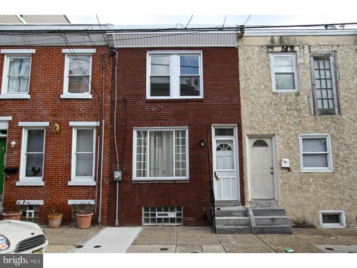 Welcome to this two story, two bedroom brick front rowhome in hot East Kensington. This property has a large private fenced in cement rear yard perfect for entertaining.  Enter in to a formal living room divided by a staircase with open modern style had crafted steel railings. There is a formal dining room and both the living and dining room have solid hardwood floors. The kitchen, located in the rear of the home is completely renovated with ceramic tile floors, glass tile subway back splash, stainless appliances, solid wood cabinets with granite counter-tops. The basement is unfinished but fully painted and pristine with all new utilities. Forced hot air and central air conditioning included. The 2nd floor has 2 bedrooms with hard wood floors and a beautiful hall bath with ceramic tile and storage vanity.  Just unpack your bags and move right-in.  Close proximity to all the Fishtown restaurants and coffee shops on Frankford Ave as well as public transportation. Parking is a breeze. This is a must see and will not last !  Make your appointment today.