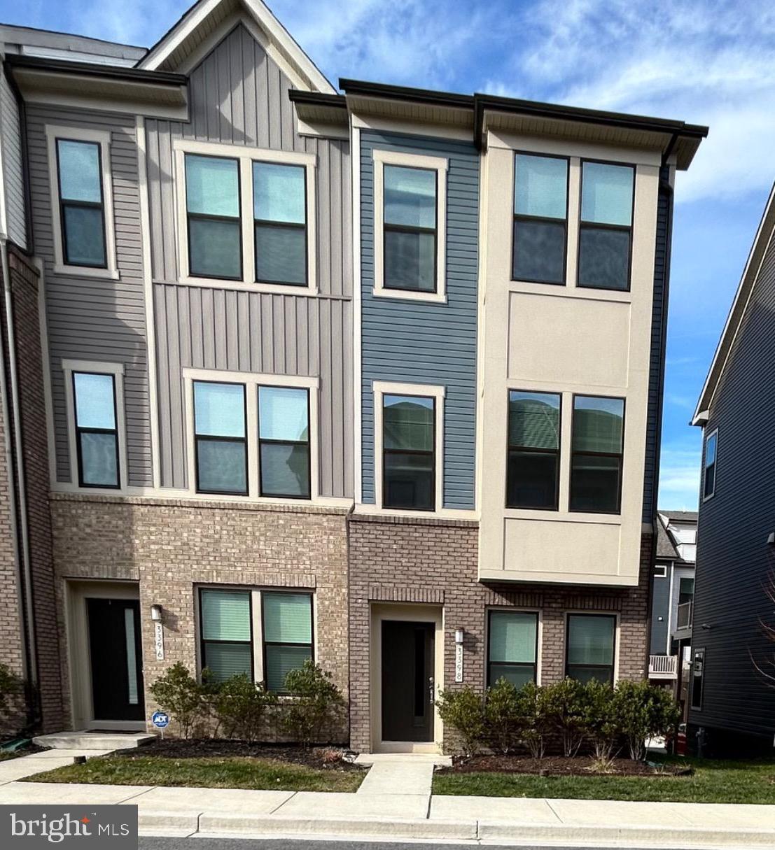 Welcome to this 3-year-young contemporary end-unit townhome offering 1,632 sq ft, 9’ ceilings, 3 bedrooms, 3.5 baths, a 1-car attached garage, and a spacious deck. The entry level features a flexible main-level bedroom ideal for a guest suite or home office, complete with new luxury vinyl plank flooring, a full bath, coat closet, and direct access to the one car garage with extra storage.

The second level showcases a bright open-concept design filled with natural light and enhanced by luxury vinyl plank flooring throughout. The spacious sunlit family room with window bump out flows seamlessly into the modern kitchen which includes stainless steel appliances, stylish pendant lighting, a large center island and pantry.  The adjacent café/breakfast room opens to a 14’ x 10’ deck, perfect for entertaining or unwinding outdoors. Also a convenient powder room.

The upper level offers a light-filled primary suite with two walk-in closets, a ceiling fan, and a private ensuite bath featuring a double vanity and walk-in tiled shower. A second bedroom with window bump out also includes a walk-in closet and its own private ensuite bath. A hall laundry closet adds everyday convenience.

Residents of Watershed enjoy wonderful community amenities including 2 clubhouses, 2 fitness centers, dog parks, 2 community pools, community gardens, scenic walking paths, picnic areas, pickle ball, tennis court, multiple playgrounds, soccer field, multiuse field, golf simulator and more. 

Ideally located just minutes from Fort Meade, NSA,  NBP, DISA, and U.S. Cyber Command.
Major commuter routes including 32, 295, 100, I-95, 495, and 50, providing easy access to Washington, D.C., Baltimore, Annapolis, BWI and the MARC station. Close to Arundel Mills Mall which offers shopping, dining, and entertainment including the Live Casino!