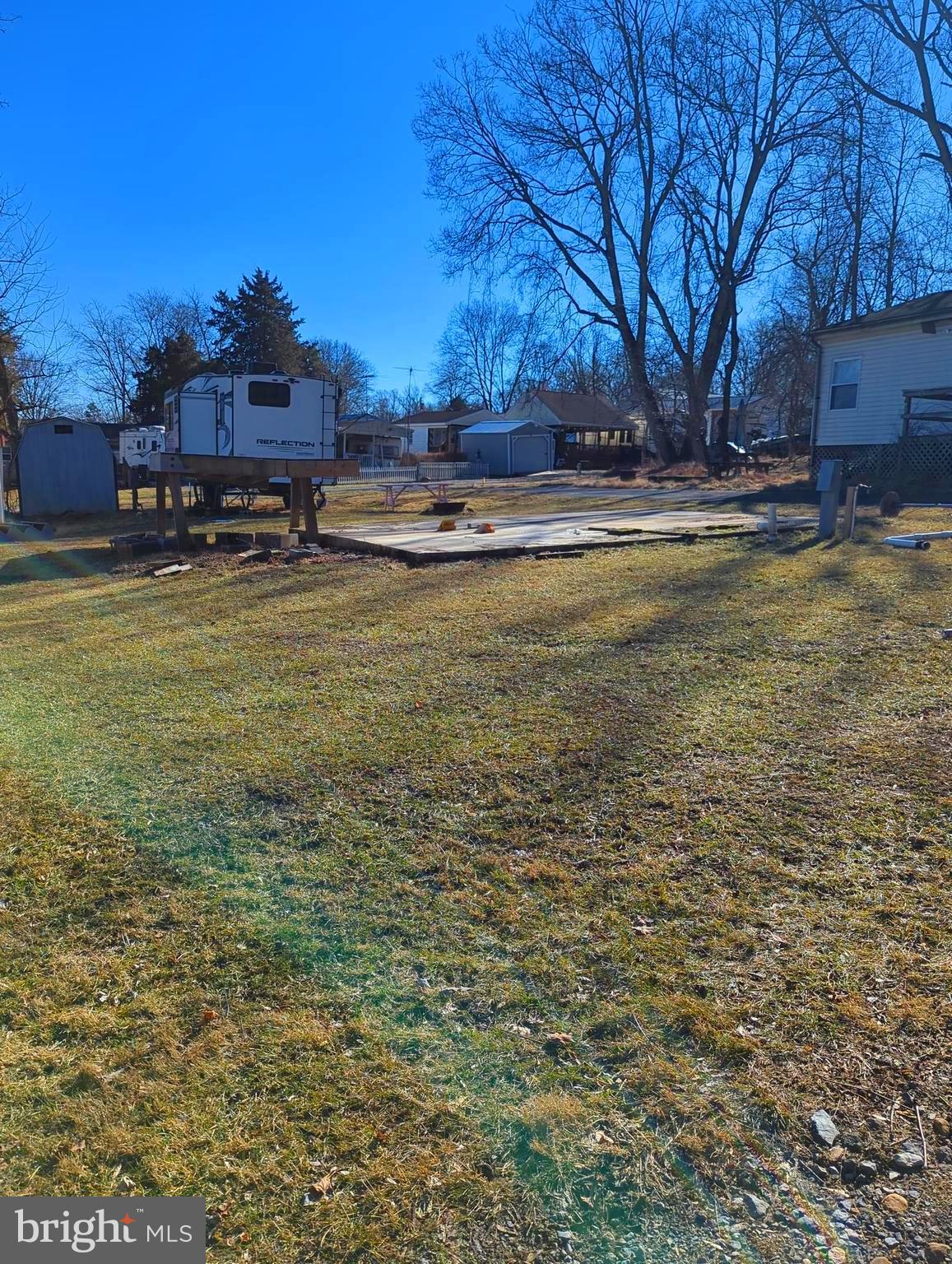 ***Property Details *** Great level lot.  Empty lot to make your own with sewer hookup.  Lot has a concrete pad where you can park your camper and have a nice concrete pad to walk out onto. Come and check out this amazing lot **** Lets bring an offer to to table! ***BRING YOUR BEST OFFER*** YOU WON'T WANT TO MISS THIS ONE. This is a gated community so you need to enter at the guard shack. Entry is not permitted without ID per the office rules. Bring ID's to the office or guard shack for visitor pass. THIS IS A SEASONAL CAMPGROUND! OPEN FROM APRIL 1 TO NOVEMBER 1. ** WELCOME TO RIVER BEND/SEASONAL LOT AVAILABLE TURN KEY** River Bend is a privately owned 400 acre recreational- vehicle camp resort with seasonal activities for members, families and guests. This great RV park is tucked away on the Upper Potomac River of West Virginia, River Bend is one of West Virginia's most popular family seasonal destinations. . Just a short drive from the Washington and Baltimore metro area. Open with utilities from April 1 to November 1. Lot owners have access to their property the entire year. *** Members Enjoy *** * Amazing views and wildlife, Potomac River access, Trails, Swimming pools, Mini-Golf, Youth center, Tennis and basketball courts, laundry facilities, convenience store, deli and lounge. *Bath houses through out the park, boat ramp, bar and grill and even a church located on the grounds. River Bend also hosts numerous activities such as 4th of July fire works, small carnival, bonfires, poker runs, horse shoe tournaments, car show, Halloween Trick or Treat and so much more.