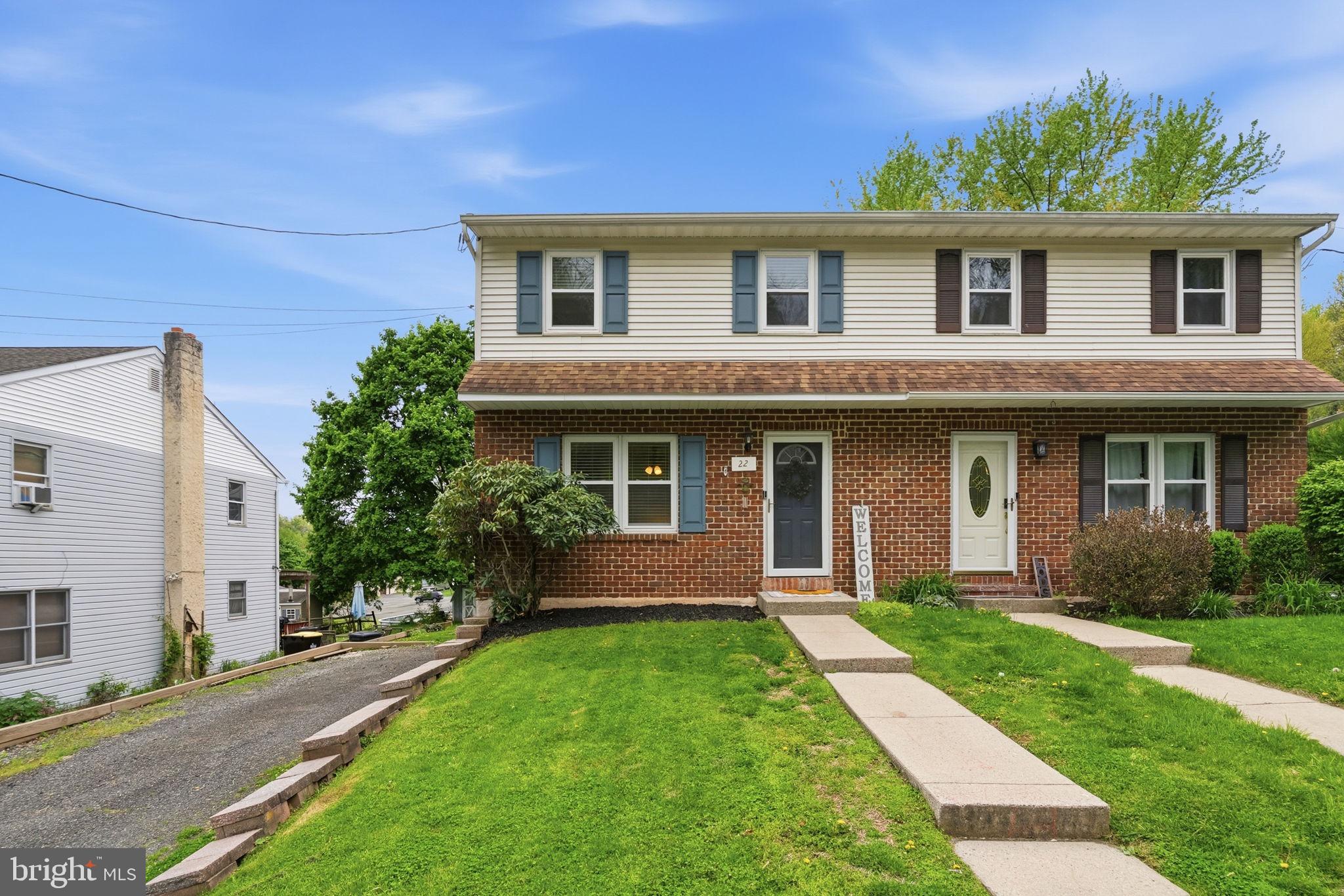Some homes you have to imagine yourself into. This one you just move into. 22 Cherry Street is a beautifully updated twin in the Boyertown Area School District, ready from the very first step. The open main level flows from a bright living room into a dining space wrapped in a custom board and batten accent wall, then into a kitchen that genuinely stops people: sage green cabinetry, stainless KitchenAid appliances, subway tile, and a slider that opens right out to the deck. Three bedrooms share a fully refreshed full bath with a double vanity and modern black fixtures, and a half bath on the main floor keeps things easy for guests. The full basement adds finished bonus space plus all the storage you have been missing. Out back is the real surprise, with a multi tier deck, a stone fire pit, and a deep, level yard built for fire pit nights and weekend gatherings. Updated, well cared for, and ready for its next chapter.