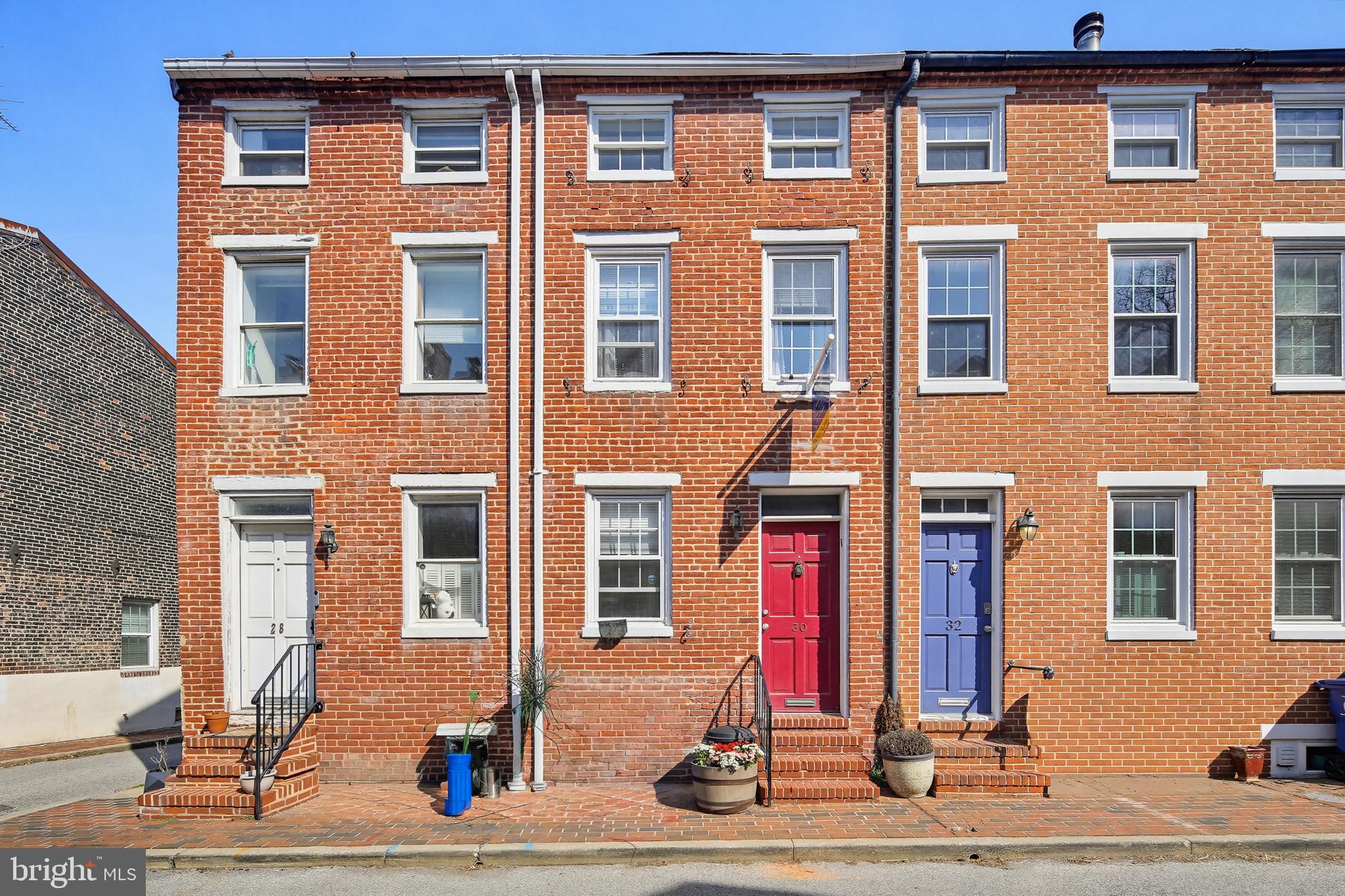 Welcome to this classic 2 bedroom brick row home, where historic charm meets modern comfort. Sited on a quiet street, within walking distance to fabulous amenities, this home is filled with original character and timeless appeal. Original hardwood flooring on 3 ample levels of living space, a woodburning fireplace, upgraded kitchen with stainless/granite/breakfast bar, spacious primary bedroom with built-ins, landing large enough to be a home
office or sitting room, full tiled bath with built-ins, and an amazing loft/2nd bedroom with skylights: this home offers unique features on all levels. The patio, located off of the kitchen, adds living space and is perfect for entertaining and relaxing.
This is an amazing opportunity to buy an affordable home in much desired Federal Hill! Walk to Cross Street Market, Camden Yards, M&T Stadium, Blue Moon, and so much more. This home offers a manageable footprint that allows you the opportunity to relax and enjoy all of the things our wonderful city offers!
Call Nancy to see if you qualify for a 4.99% interest rate to purchase this home.