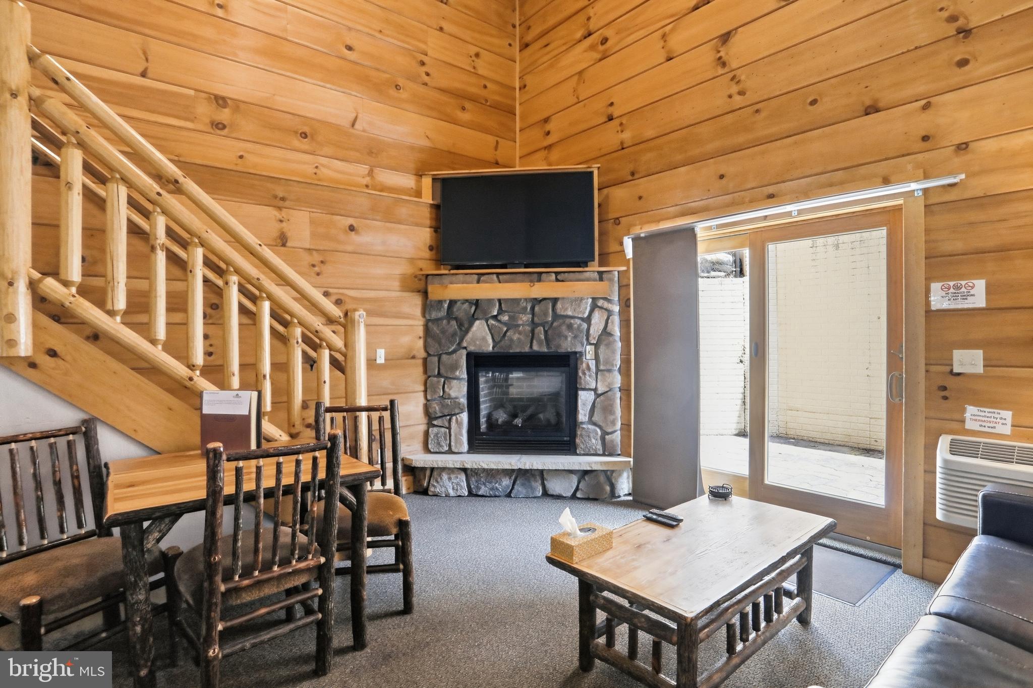 COMMUNITY LAKE ACCESS! SHARED BOAT SLIPS! LAKE & SKI SLOPE VIEWS! JULY 4th VIEWS! FULLY FURNISHED!

Proven rental income meets the Deep Creek Lake lifestyle. Welcome to The Lodges at Sunset Village, where fully furnished, turnkey cabins offer the rare opportunity to own a vacation home with an established history of short-term rental success. Whether you're looking for a personal getaway, an income-producing investment, or the perfect combination of both, these cabins deliver exceptional value in one of Deep Creek Lake's most sought-after waterfront communities.

The Lodges at Sunset Village have a proven history as one of Deep Creek Lake's top-performing vacation rental communities, with historical annual rental income averaging approximately $38,000 to $78,000 and estimated gross rental yields ranging from 11% to 15%, depending on the cabin.

Rich in mountain character and designed for easy ownership, each cabin features warm wood interiors, inviting living spaces, outdoor gathering areas, and beautiful lake and mountain surroundings. Community amenities include shared lake access, boat slips, a spacious waterfront dock, a lakeside gazebo, fire pit, playground, abundant parking, and professional on-site management.

Owners enjoy community lake access with shared waterfront amenities, including community owned boat slips, a spacious waterfront dock, and areas for kayaking, fishing, swimming, and enjoying everything Deep Creek Lake has to offer.

The monthly condominium fee covers cable, internet, water, sewer, electricity, gas, trash service, snow removal, lawn care, exterior maintenance, pest control, and more, creating a truly low-maintenance ownership experience.

Owner financing may be available. Call today for current availability, historical rental performance, financing options, and your private tour before these exceptional Deep Creek Lake cabins are gone.