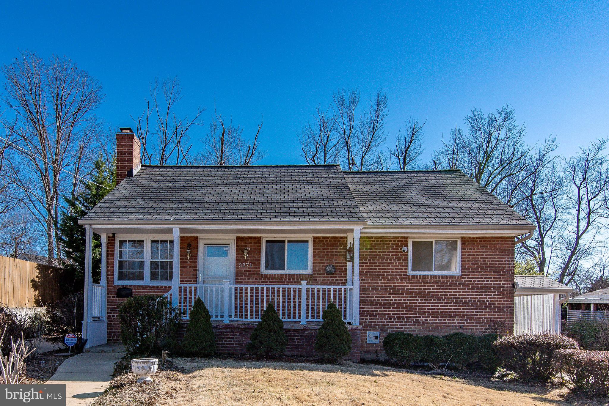 Charming all-brick, two-level home featuring three bedrooms and two full bathrooms, located in the highly desirable Broyhill Park neighborhood. The beautifully updated kitchen boasts newer cabinets and newer stainless-steel appliances. 3 bedrooms on the main level. Finished walk-out basement offers a spacious rec room, a second full bathroom, a second kitchen. Seperate laundry room.  Outside, you'll find ample driveway parking, a large workshop, and two additional sheds. The expansive, level lot is dotted with mature trees, making it perfect for gardening, relaxing, or entertaining. Conveniently situated near Route 50, I-495, shopping, dining, and schools, this home offers the perfect blend of comfort and accessibility. *Please note: the fireplace is currently not operational.