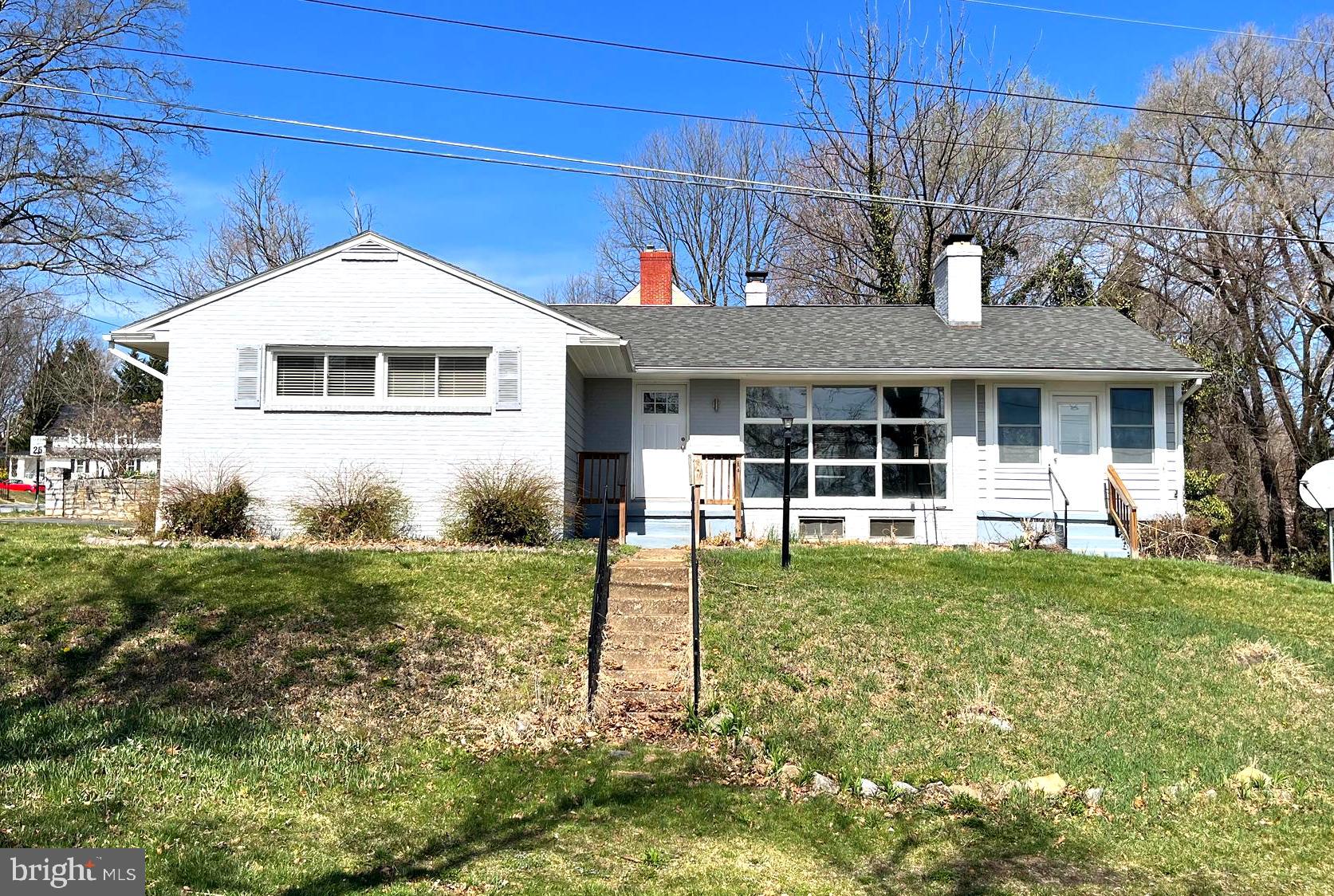 Move In Ready, 3-bedroom 1.5 bath rancher, sitting on a partially finished basement in Charles Town. This home has over 2200 total finished square feet and overlooks Charles Towns City Park. Features include: a sunroom, attached carport, tiled shower, two fireplaces, and newly refinished hardwood floors throughout the main level, as well as LVP flooring in the basement. Schedule a showing today!