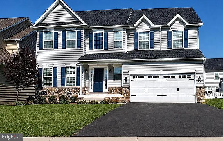 Welcome to 2120 Sunnyvale Drive in the highly sought-after Northgate community! Offering 2,829 square feet above grade plus an additional 662 square feet of finished walk-out basement space, this beautifully upgraded home provides over 3,490 square feet of finished living space designed for today's lifestyle.

The flexible floor plan features 4 bedrooms, 2.5 bathrooms, and a private flex room with French doors that is perfect as a home office, nursery, guest room, or potential fifth bedroom. Hardwood flooring flows throughout the entire first floor, main staircase, and second-floor hallway, while 9-foot ceilings on the main level and 8-foot ceilings on the second floor and finished basement create an open and spacious feel throughout.

The heart of the home is the stunning white kitchen featuring Granite countertops, a floor-to-ceiling backsplash, and an oversized 7-foot center island that is ideal for entertaining. The finished walk-out basement expands the home's living space and includes plumbing for a future third full bathroom along with an oversized storage area.

Additional highlights include a redesigned laundry room with cabinetry and quartz countertops, smart-home technology featuring Nest doorbell, smart lock, Nest Hub, smart lighting throughout, Cat 6 wiring, upgraded HVAC, four-zone irrigation system, Kinetico water softener, and smart baseboard heating controls in the basement.

Outdoor living is just as impressive with a 12' x 16' deck, gas grill connection, and a beautifully maintained yard supported by a full-property irrigation system. The insulated garage features an epoxy-coated floor, custom storage cabinets, Proslat wall organization systems, overhead storage racks, and a Wi-Fi-enabled garage door opener.

Meticulously maintained and thoughtfully upgraded throughout, this move-in-ready home offers the perfect combination of space, technology, storage, and comfort in one of Pennsburg's most desirable neighborhoods.