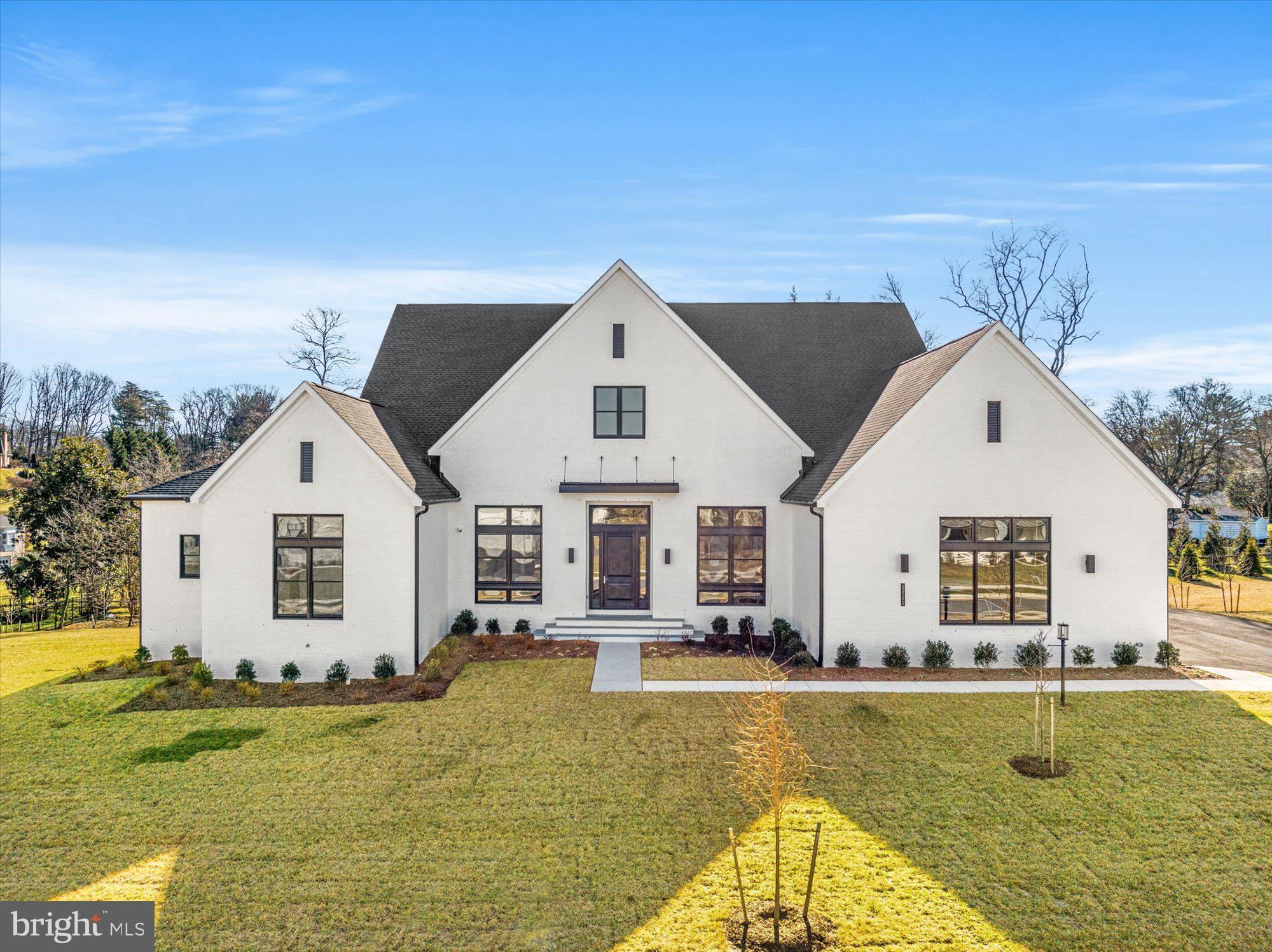 New Price! Welcome to 1221 Riley Preserve Ct, an exquisite more than 8,000 sq/ft five bedroom, five full- and two-half bath home in Great Falls featuring all of the benefits of new construction plus elevated end user finishes and custom touches that create a harmonious sanctuary for luxury living.

Step inside to discover a grand foyer adorned with soaring ceilings, custom millwork, and gleaming hardwood floors that lead you through the expansive living spaces. Just off the foyer is a sizeable office and a spacious dining room. The main living room is an entertainer’s dream with gas fireplace and accordion doors that lead to a large heated outdoor patio complete with automatic mosquito screens. The gourmet kitchen is a chef's dream, featuring top-of-the-line appliances, expansive countertops, dual ovens, an oversized pantry and eat-in breakfast area.  

Retreat to the private and light filled primary suite that boasts an incredible spa like bathroom with an oversized shower, soaking tub, dual vanity and dual walk-in closets. Two additional bedrooms with ensuite bath and an in-law suite with a separate sitting room,  private laundry and ensuite bath round out the main level.

The lower level main recreation room has been elevated with all of the finishes you hope to find in a house of this magnitude and features a custom bar and a theatre screen with projector. Just beyond is a spacious gym and recreation room boasting a golf simulator and rubber gym floors that rival any fitness studio. The home’s fifth bedroom with ensuite bath, a bonus den/office and a walk-out patio complete this level.

A three-car garage that leads to a generous mud-room is the cherry on top of this gorgeous home that is not to be missed. Located just minutes from Tysons Corner and Wolf Trap, the home is zoned for Spring Hill Elementary, Cooper Middle and Langley High.