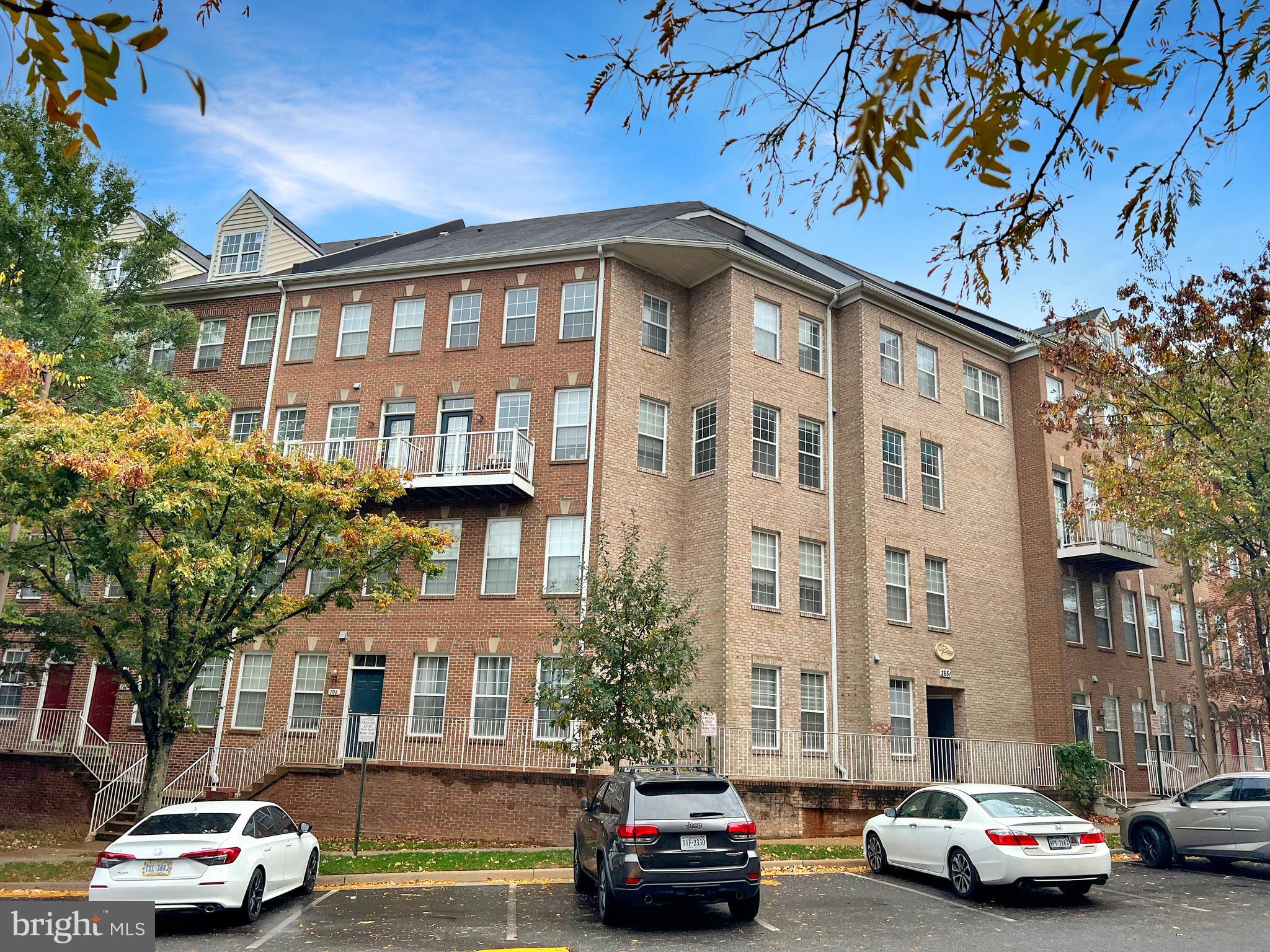 This Stunning light and bright two-level condo across from The Mosaic District and Dunn Loring Metro really shines! Main level has open concept living with wall of large windows, new lighting, corian counters, stainless steel appliances, 1/2 bath and door to balcony that faces the pool and clubhouse. Upper level has 2 bedrooms, both with walk in closets, 2 full bathrooms and a laundry room with newer washer/dryer. Ceiling fans were added for additional comfort. Large primary bedroom has walk-in closet and en-suite with large, oversized tub and standing shower. NEW HVAC system. Building has secure entry, 2 garage parking spots (#17 & 18) AND 2 assigned spots. Community includes pool, fitness center/clubhouse. Walk across the street to the Metro, Starbucks, Target, Organic Market, movies and all the Mosaic District has to offer! Numerous restaurants, shops, grocery, gym, INOVA primary care, park, W & OD Bike Trail and more! This is the most convenient living! You won’t want to miss this one!