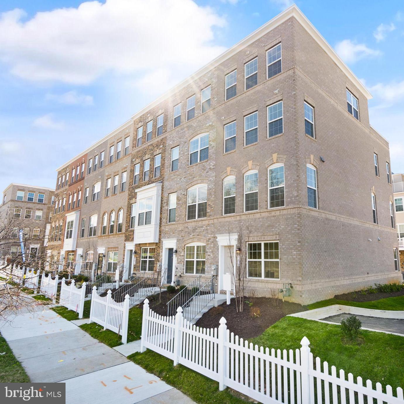 IMMEDIATE DELIVERY. End Unit. Composite Rear Deck, Fireplace in Living Room, LVP Floors entire Main Level. Skytowns 42 Base (42B). Full Brick Front 4-Level Urban Towns with 2 Car Garage. Rooftop Terrace, 10-foot Kitchen island, Owner's Soaking Tub, Huge Owner's Walk-in Closet, Interior Unit, 3 Bedroom, 2 Full and 1 Half Bath, Stainless Appliances, Quartz counters in Kitchen, Upgrade Ceramic Tile Baths, Maple, soft-close Cabinets with Crown Trim. Apply through rentspree. Security Deposit of 1 months rent due at lease signing.