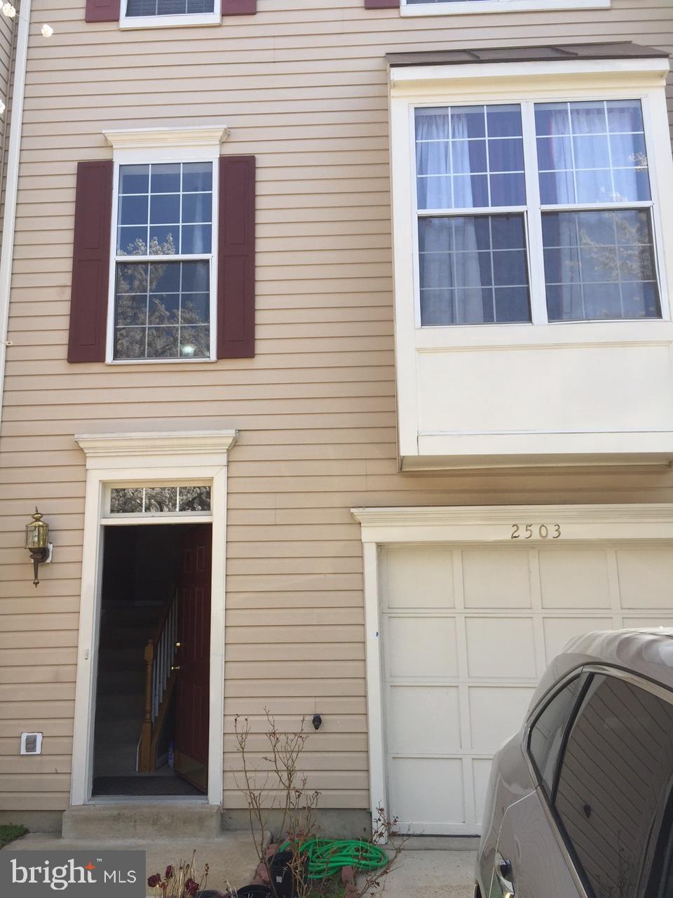 Beautiful 3-bedroom, 2.5-bath, three-level townhome with a 1-car garage. Features include a ceramic tile foyer, spacious recreation room, hardwood floors throughout the main level, and an upgraded eat-in kitchen with granite countertops and stainless steel appliances. The primary suite offers a walk-in closet, and the private deck is perfect for relaxing or entertaining. Convenient floor plan with generous living spaces and modern finishes throughout. Move-in ready and a must-see!