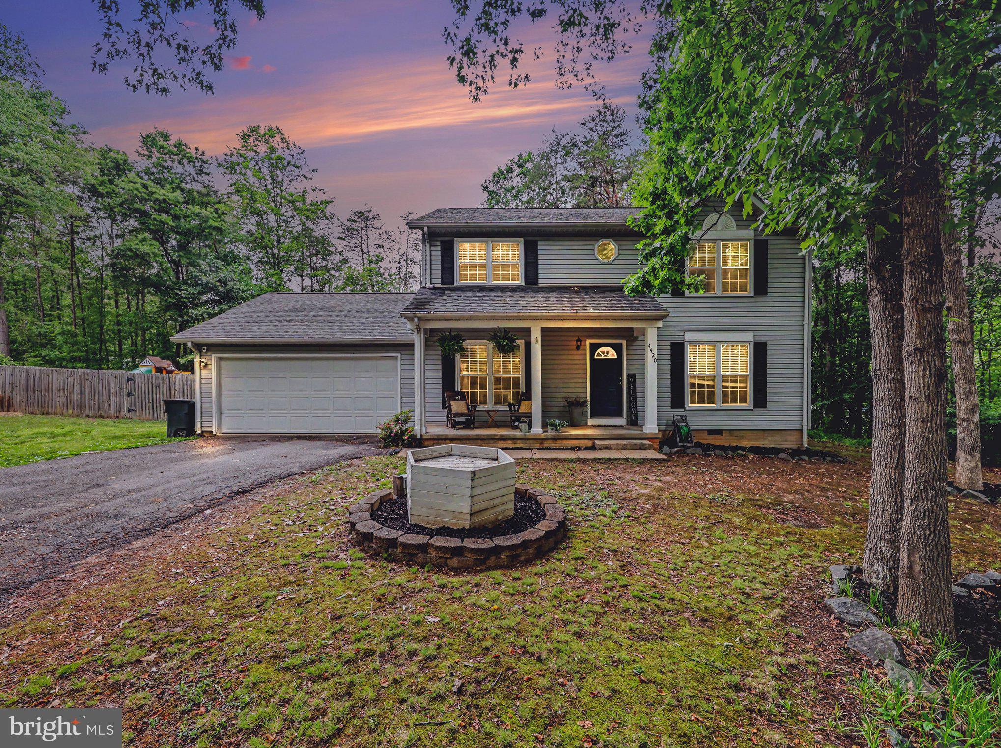Beautifully updated home situated on just under one acre with a fully privacy-fenced backyard, brand new deck, and storage shed — offering both comfort and outdoor enjoyment with no HOA.

This cozy yet spacious home features 3 generously sized bedrooms plus a den currently being used as a 4th bedroom, along with 2 full bathrooms on the upper level. The primary suite includes two closets and a private en-suite bathroom. Throughout the home, you will find durable LVP flooring, ceiling fans in multiple rooms, and a warm, inviting family room centered around a wood-burning fireplace.

The updated kitchen is conveniently located just off the laundry room and attached 2-car garage, creating a functional and practical layout for everyday living. Relax and enjoy peaceful mornings or evenings from the covered front porch while taking in the privacy and space this property has to offer. Distribution Box replaced 2020, New pump & Floats 2021, Upper level HVAC 2024, Appliances 2024.