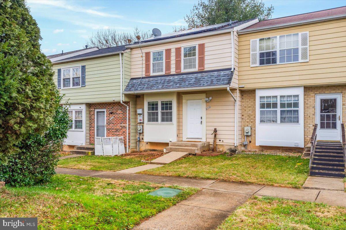 Quaint townhome in a prime location, less than 5 miles from the Shady Grove Metro.

Upon entry, a convenient half bath sits to the right, while the kitchen welcomes you to the left. Straight ahead, the home opens into a bright and comfortable living area. The kitchen features attractive cabinetry that extends to the ceiling for additional storage, stainless steel appliances, gas cooking, and neutral tile flooring. Table space near the front window provides the perfect spot for everyday meals, while the kitchen flows seamlessly into the dining area, highlighted by a modern chandelier.

Hardwood flooring runs throughout the main living level. Just off the living room, a deck makes outdoor dining and entertaining effortless, with a large mature tree providing shade and added privacy. The home backs to  a lovely stream and HOA-owned open space. The entire home has been recently painted in a neutral palette, making it truly move-in ready.  Solar panels with Power Purchase Agreement (PPA) offer energy-saving benefits.

Upstairs, hardwood flooring continues throughout. The full bathroom in the hallway has been recently renovated with chic, modern finishes. The primary bedroom features a walk-in closet.

The lower level offers fresh new carpet and a sliding door to the outdoors, providing easy access for outdoor play. An unfinished area houses additional storage, the laundry room, a convenient utility sink, HVAC equipment, and the water heater. Notable updates include a new roof (2021), updated gutters and exterior fascia (July 2019), and newly installed gutter guards in 2024.

The community offers an impressive array of amenities, including the Flower Hill Swimming Pool complex with multiple pools for all ages. Residents also enjoy access to a community center, several tot lots and playgrounds, and nearby parks featuring tennis courts, basketball courts, soccer fields, and open green space. Flower Hill Park and Nike Missile Park are located within the community while Strawberry Knoll Park is located nearby, offering even more recreational options.

This property offers easy access to the Flower Hill Shopping Center, home to Giant Food, Starbucks, Wingstop, Subway, and more. Popular nearby dining options include Gentleman Jim’s, Café Sophie’s, and Jasmine Cuisine. Commuters will appreciate the close proximity to major routes such as I-270, I-370, MD-355, MD-200, and the Shady Grove Red Line Metro Station.