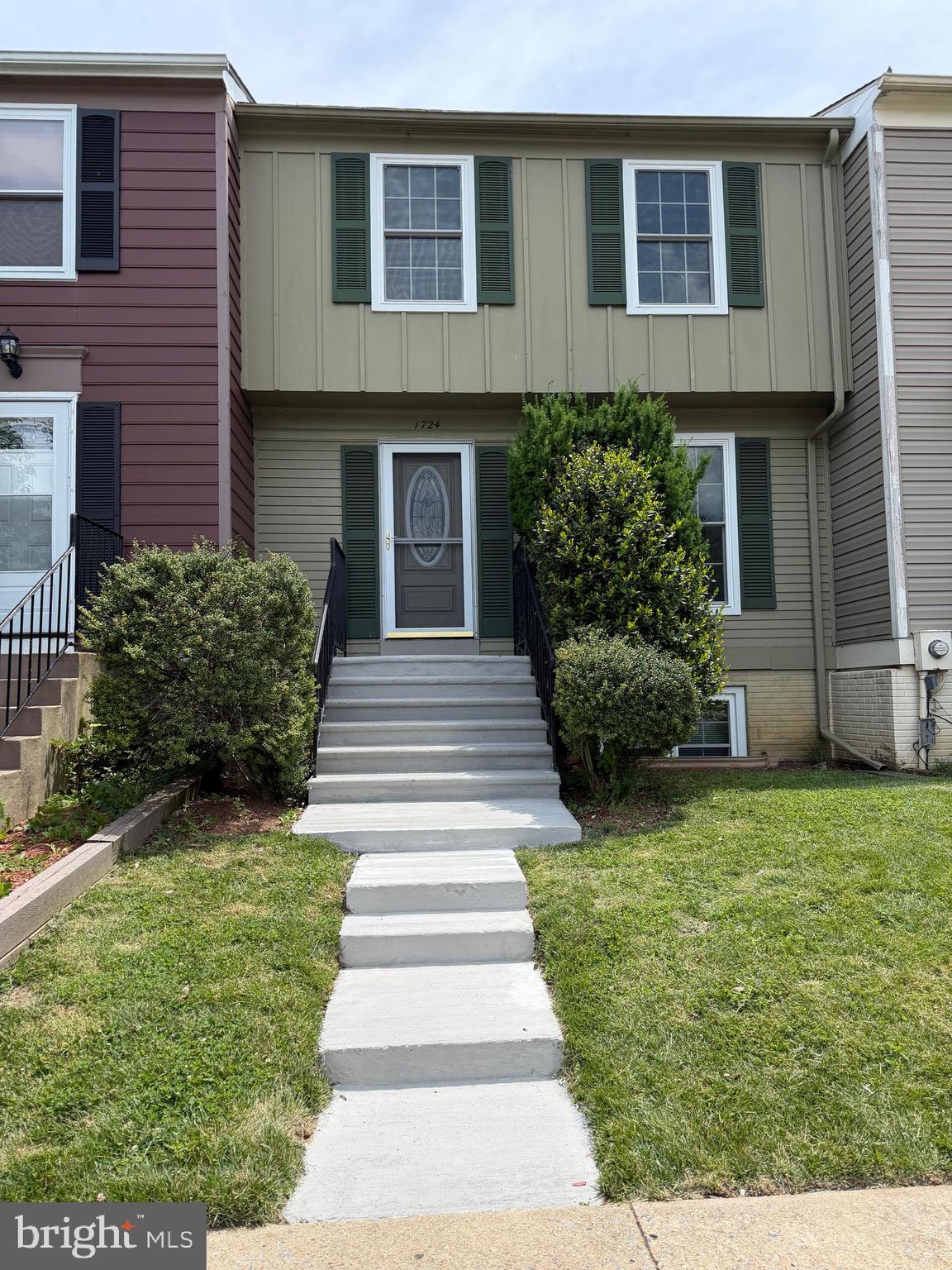 Charming & Move-In Ready 3-Bedroom Townhome in Carroll Park Manor, Frederick City. This well maintained townhome in sought-after Carroll Park Manor offers the perfect blend of comfort, style, and convenience in the heart of Frederick City. Freshly painted throughout with New Hardwood Flooring on the Main and Upper Levels, this home feels bright, and welcoming the moment you step inside.  Features: 2 Assigned Parking Spaces, Newly resurfaced concrete front steps and porch, Fenced backyard for outdoor enjoyment. Rear Deck with NEW Decking and Railings.     Main Level:  A Front-Facing Kitchen with New Refrigerator, Garbage Disposal and Passthrough flows effortlessly into a spacious, open dining and living area. Step out onto the Upgraded Deck—perfect for morning coffee, evening grilling, or relaxing with friends.  Upper Level:  Generous sized Primary Bedroom, Bedrooms #2 & #3 and a Remodeled Full bathroom. The Primary Bedroom offers convenient private access to the bath, while the hallway entrance provides easy access for guests or family.  Lower Level: A versatile finished space featuring a front recreation room, a large family room, and a second Remodeled Full Bathroom. The Washer/Dryer closet and direct access to the Rear Yard make this level both functional and flexible—ideal for a home office, guest suite, or entertainment space. Don’t miss this turnkey townhome in one of Frederick’s most convenient neighborhoods. With fresh updates, low-maintenance living, and excellent proximity to downtown Frederick, parks, dining, and major commuting routes, this property is ready for you to simply move in and enjoy.