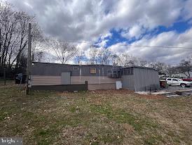 Mobile Home on almost 10 Acres with I81 Road Frontage! Public water and sewer to the mobile home and accessible for the remaining acreage. Many potential uses including residential or multifamily development, mini storage, firework sales, billboards, etc... Three parcels included in sale, and a single wide manufactured home. The two front lots could act as a large entrance to the larger parcel sitting against the I81. Owner is currently clearing trees for an entrance into the acreage. No known restrictions, county approvals would be required for development. Call for details!