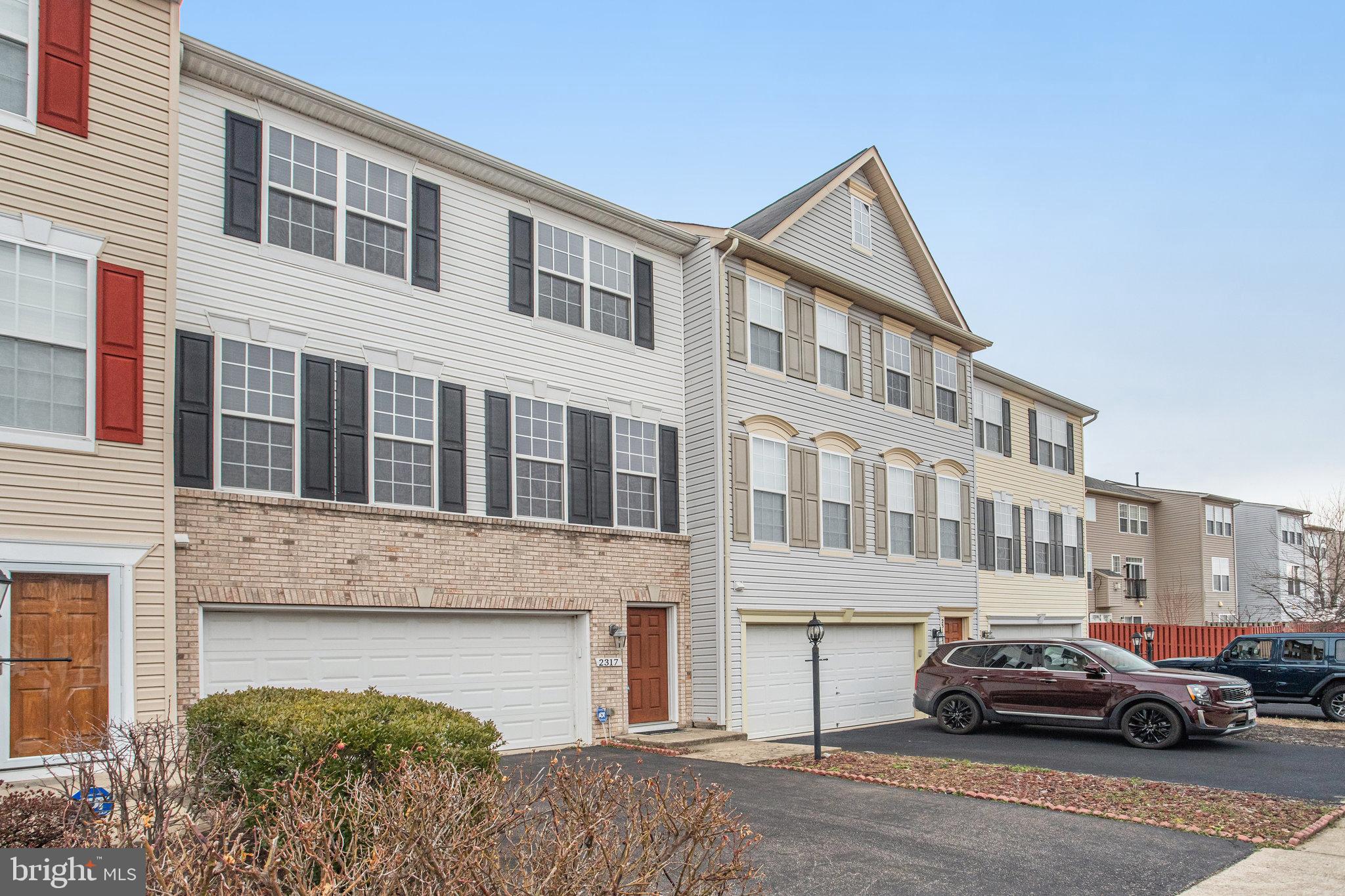 Spacious and light 3 level townhome  with "rear bump out" and 2 car garage has sparkling wood floors on main level  and is ready for occupancy in early March. Open kitchen with center island in great room provides room  for relaxing or designing gourmet meals. Primary bedroom on upper level is generously proportioned.  Ensuite bathroom has large soaking tub and separate stall shower. Ceiling fans in all upper level bedrooms.  Finished,on-grade walkout lower level has 4th bedroom. and full bath, convenient for guest bedroom or home office.  Owner prefers 12 month lease.  Online application.  Sorry no pets and no smoking.