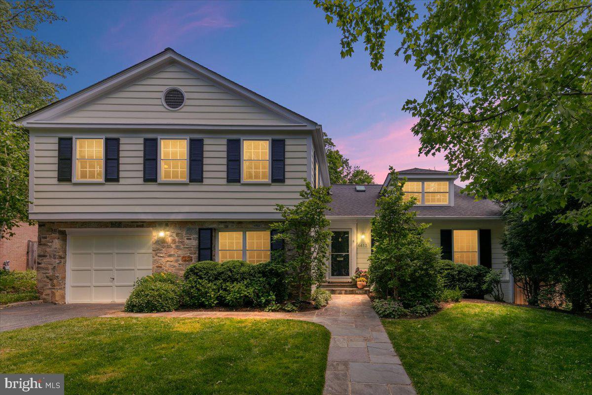 Extensively renovated and greatly expanded Split-Level Colonial in the sought-after Mass Ave Forest, provides stylish and comfortable living space, indoors and out, perfectly suited for gatherings, elegant entertaining and the demands of daily living.

Move-in ready, 6413 Kenhowe Drive includes 6 bedrooms and 4.5 bathrooms, all recently remodeled. This home features a stylish stone-front facade, cook's kitchen with enormous island and generous table space, a charming owner's suite with expansive closets and separate sitting area, and a large but cozy family room with custom cabinets. The living space connects seamlessly to a stunning outdoor zone that boasts a grand, three-season screened-in porch with gas fireplace, a spacious bluestone dining patio with built-in, top-of-the-line gas grill, an expansive Ipe deck with gas fire pit, and a lovely rear lawn.

The large cook's kitchen is equipped with soapstone countertops, two dishwashers, three ovens, abundant storage, including a separate pantry, and generous gathering spaces perfect for everyday living and entertaining. The hub of the house, the kitchen opens to an oversized dining room, the family room, the screened porch, and the deck area, allowing for gracious indoor-outdoor living.

Upstairs, the expanded primary suite is a hideaway set apart from the other bedrooms, offering walk-in closets and a beautifully updated bathroom. The upstairs features four additional, spacious bedrooms, and two additional full baths, one en-suite.

The finished lower level includes another gathering area plus an additional bedroom and full bath, ideal for guests, an au pair, or flexible living space. Additional highlights include a first-floor study with custom built-ins, custom-designed powder room, extensive renovations completed in 2013 and 2015, and attached garage parking.

Ideally located near downtown Bethesda and Friendship Heights, this special home also is less than a block from the neighborhood pool and near Glen Echo Park and the C&O Canal. It offers easy access to Downtown DC and is minutes from the Beltway.