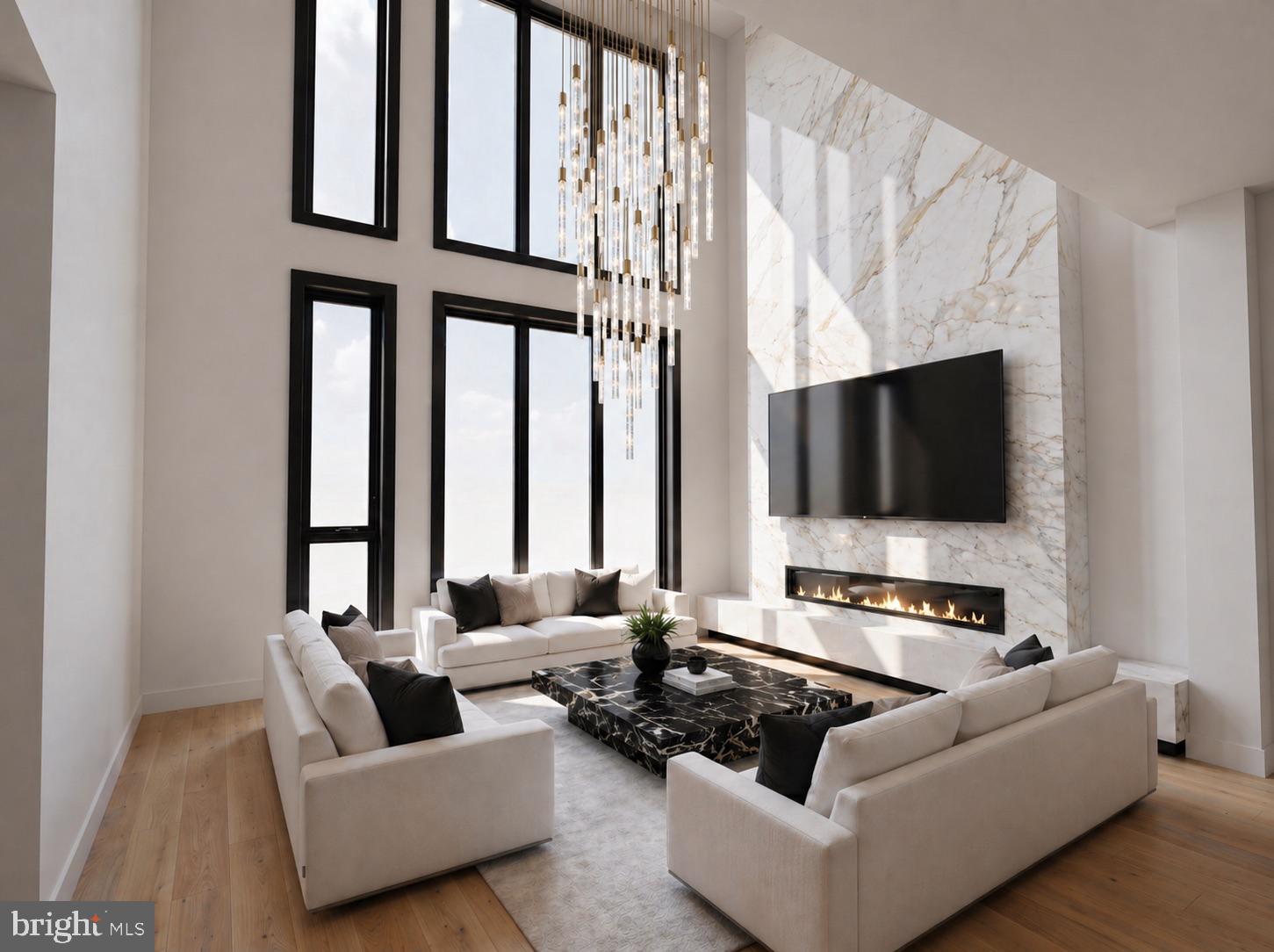 Introducing 139 S 24th Street, a newly constructed townhome in Fitler Square, located within the highly sought-after Greenfield School Catchment. This residence is curated through a quiet luxury approach designed for timelessness. Character is reimagined through modern architecture, with details that convey true sophistication.

Neighboring the private Fitler Club and Schuylkill River Trail, the home offers 4 bedrooms, 5 bathrooms, and over 5,100 square feet of living space. The 3+ car attached garage residence blends convenience and functionality, and includes a 10-year tax abatement.

Enter via a 6-stop elevator to the second level, where a custom, award-winning Joanne Hudson-designed kitchen introduces an elevated level of craftsmanship. Showcasing 13-foot ceilings, partially exposed glass cabinetry, Sub-Zero and Wolf appliances, a large Calacatta kitchen island and backsplash, and a private deck. The layout flows effortlessly into the dining and living areas, highlighted by dramatic 20-foot floor-to-ceiling windows, a custom floor-to-ceiling marble slab fireplace, and statement lighting.

The third floor offers a flexible loft space overlooking the living area below, positioned at the front of the home and surrounded by natural light from the 20-foot ceiling drop, complete with custom built-ins and a wet bar. Toward the rear, an en-suite bedroom and generous closets provide additional comfort and privacy. The fourth floor features two additional en-suite bedrooms, each thoughtfully designed with large closets.

The entire fifth floor is dedicated to the primary suite, offering a true retreat with a fireplace, wet bar, two walk-in closets, and a spa-style bathroom with an oversized shower, soaking tub, and double vanity. A private balcony further enhances the suite.
Crowning the home is a dual-sided roof deck, designed for entertaining with a wet bar and skylight elements in the pilot house, offering unobstructed Center City skyline views to the rear and Schuylkill River views to the front.

Minutes from Rittenhouse Square, enjoy true city living with top restaurants, luxury hotels, spas, retail, premier fitness, and more.
30th Street Station is just minutes away, providing direct access to New York City in approximately 90 minutes, along with seamless connectivity to the Main Line and surrounding suburbs. 

Sq Ft & taxes are the responsibility of the buyer to independently verify. Keller Williams & Megan Nicoletti do not warrant or guarantee the accuracy of any tax figures, assessments, or abatement approvals, all of which are determined solely by the City of Philadelphia. Any estimated taxes are for lender and settlement purposes only and may be based on vacant land assessment. Builder specifications, timelines, and final scope of work should be independently confirmed. Expected delivery Summer 2026. Listing information is deemed approximate and reliable, reflecting the current state of the project. Photos are architectural renderings for inspirational purposes only.

Additional Features & Upgrades:
Smart home integration including Control4 system and Lutron lighting control. Option for blackout shades in the primary suite. Roof deck designed for entertaining with the ability to incorporate a hot tub and outdoor kitchen with built-in grille. Heated floors in the primary bathroom. Temperature-controlled garage with additional refrigerator/freezer, electric vehicle charger, and option to install a car lift. Flexibility to convert part of the garage level into an additional en-suite bedroom if 3+ car parking is not required. Washer and dryer in the primary suite. Custom entry foyer cubbies available (or optional placement within the garage).

139 S 24th Street sets a new standard for modern city living.