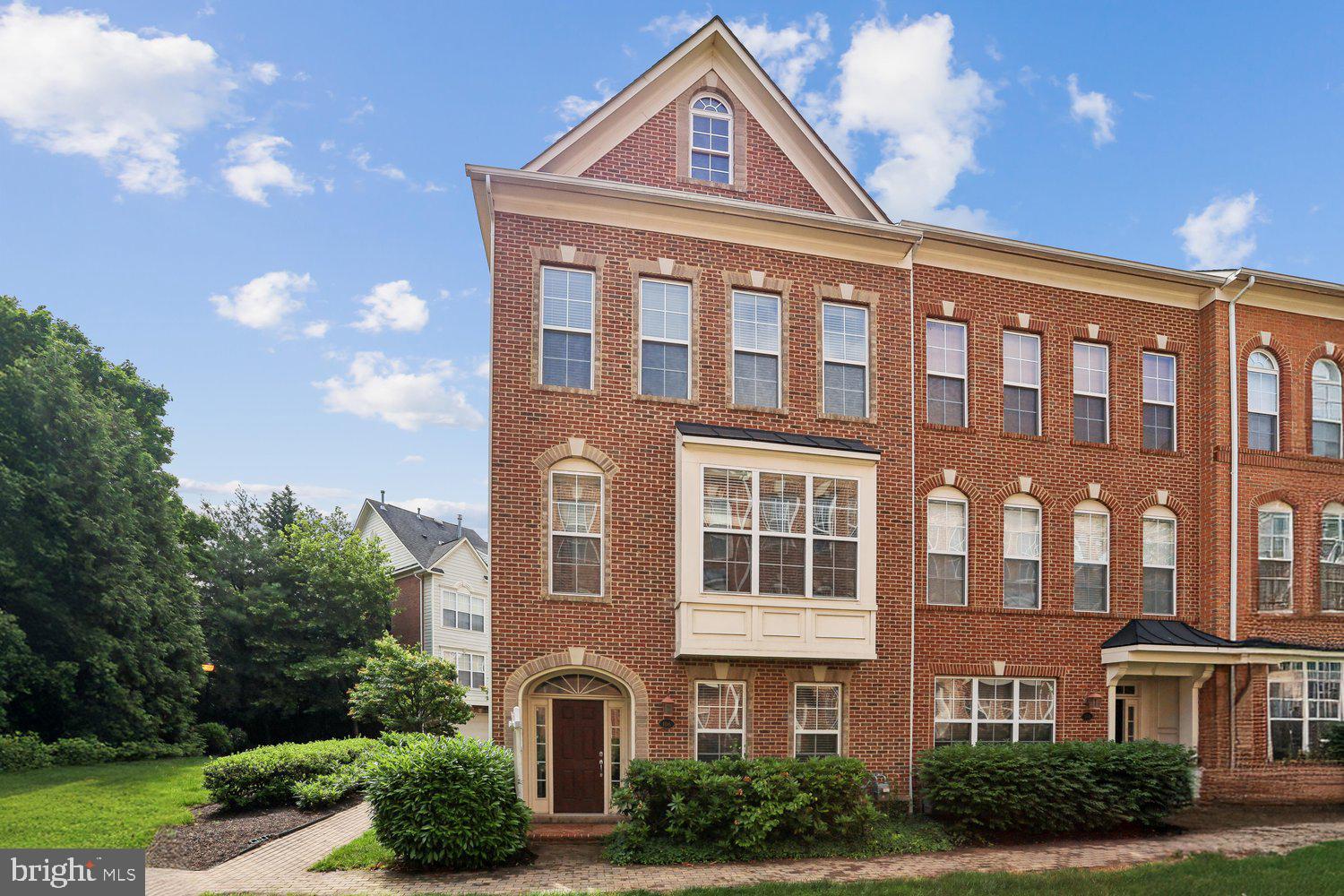 Welcome to this beautifully maintained brick end unit townhome in the sought-after community of Fortnightly Square located in the heart of Herndon. This spacious three-level home offers approximately 1,868 square feet of comfortable living space with 3 bedrooms, 2 full and 2 half baths. The open concept main level features abundant natural light, a spacious living and dining area, and a well-appointed kitchen ideal for everyday living and entertaining plus a flex space at entry level. Upstairs, the primary suite offers a private retreat with an en-suite bath and walk-in closets, while two additional bedrooms provide flexibility for family, guests, or a home office. Enjoy the convenience of an attached 2 car garage, low-maintenance living, and a prime location just minutes from the Herndon Metro Station, W&OD Trail, downtown Herndon restaurants and shops, major commuter routes, and Dulles Airport. A perfect blend of comfort, convenience, and community.