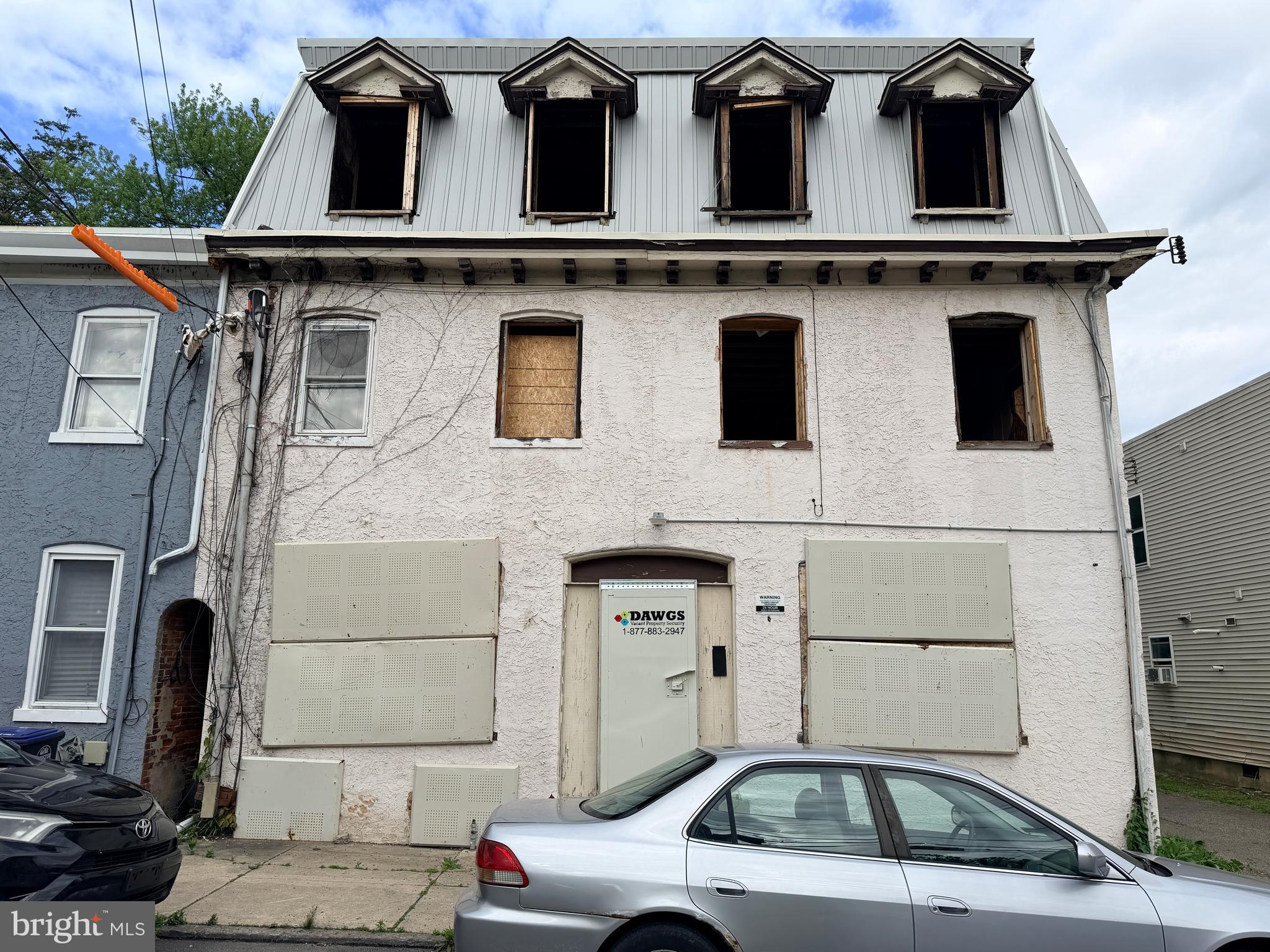 Exceptional redevelopment opportunity in Chester — this 12‑unit apartment building at 1113–1115 Upland St. is currently in shell condition and ready for a full transformation. The structure features solid construction with a stucco‑finished exterior, offering a strong foundation for a complete repositioning. Developers and seasoned investors will appreciate the generous building footprint, flexible layout potential, and blank‑canvas interior that allows for modern systems, finishes, and unit configurations. With consistent rental demand driven by proximity to Widener University, public transportation, major commuter routes, and regional employment centers, this property is well‑positioned for long‑term upside. Ideal for investors seeking a high‑yield value‑add project with significant cash‑flow potential once stabilized.