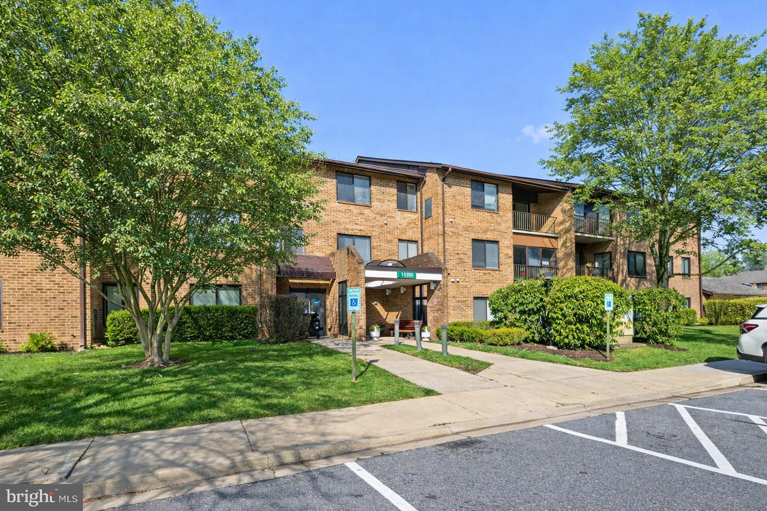 Spacious and beautifully refreshed, this two-bedroom, two-bath residence in Leisure World offers effortless living in a premier 55+ community. Freshly painted and finished with brand-new carpeting, the home is truly move-in ready.

Expansive windows throughout frame serene, tree-filled views enjoyed from the sunroom, living room, breakfast area, and both bedrooms—creating a bright, peaceful setting. The open living and dining spaces are generously sized and flow seamlessly to an enclosed terrace via sliding glass doors, perfect for year-round indoor-outdoor living and entertaining.

The updated table-space kitchen offers both functionality and comfort, ideal for everyday living. The primary suite features a large walk-in closet and a renovated en-suite bath, while the second bedroom with ample closet space, and easy access to the updated hall bath. A separate laundry room with full-sized washer and dryer, along with built-in cabinetry, adds convenience and extra storage.

Residents of Leisure World enjoy an exceptional array of amenities, including an 18-hole golf course, two clubhouses, indoor and outdoor pools, tennis courts, on-site dining, community and off-site transportation, a medical center with pharmacy, and comprehensive maintenance services. Set within a beautifully maintained 610-acre gated campus with staffed entrances, this private community offers both security and an unmatched lifestyle.  *Some photos have been digitally enhanced w/ virtual staging