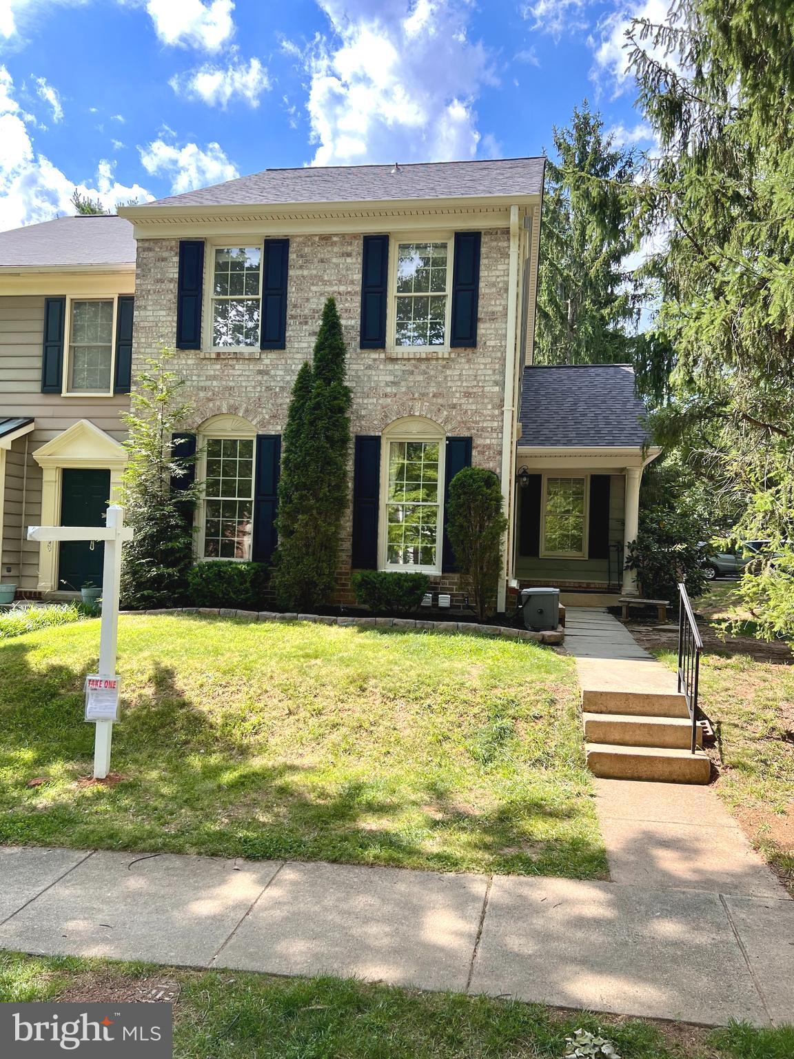 Welcome to this gorgeous brick-front end-unit townhome, located in the sought-after Holly Pointe subdivision with a private side main entrance porch. You will also have two assigned parking spaces right in front of your new home and there is plenty of visitor parking. Freshly painted with clean carpet and hardwood floors! The formal Living Room has 3 floor-to-ceiling windows and plenty of recessed lighting to shine on your everyday living. The Dining Room can easily be used as a Home Office and features a lighted ceiling fan. The huge eat-in kitchen is perfect for dining with the warmth of the gas fireplace adorned with beautiful wood surround mantel. This area may also be used as a Family Room if you choose to utilize the Formal Dining Room (instead of using it as an office). The bright kitchen includes a built-in microwave, and well-maintained cabinetry. The French doors open to a large deck perfect for outdoor dining while overlooking a peaceful, tree-lined view with an eclosed private fence. A Powder Room and coat closet complete this level. The Owner’s Suite is a true retreat, very spacious with vaulted ceilings. The finished Lower Level offers a versatile Recreation Room, with a Full Bath - ideal for guests or extended living space. A separate Laundry-Room with conveying washer & dryer, sump pump, and plenty of storage space too. For peace of mind, this home also has an indoor sprinkler system. The community has an abundance of amenities including pools, tennis courts, tot-lots and hiking trails. ADDITIONAL INFORMATION: HOA dues: $404.05 quarterly Membership includes: 4 Community Centers 6 Pools, 20 Tennis Courts 13 Pickleball Courts, 5 outdoor Basketball Courts 2 Soccer Courts (hard surface) 19 Recreation and Park Areas Community/Corporation Offices Natural Amphitheater.