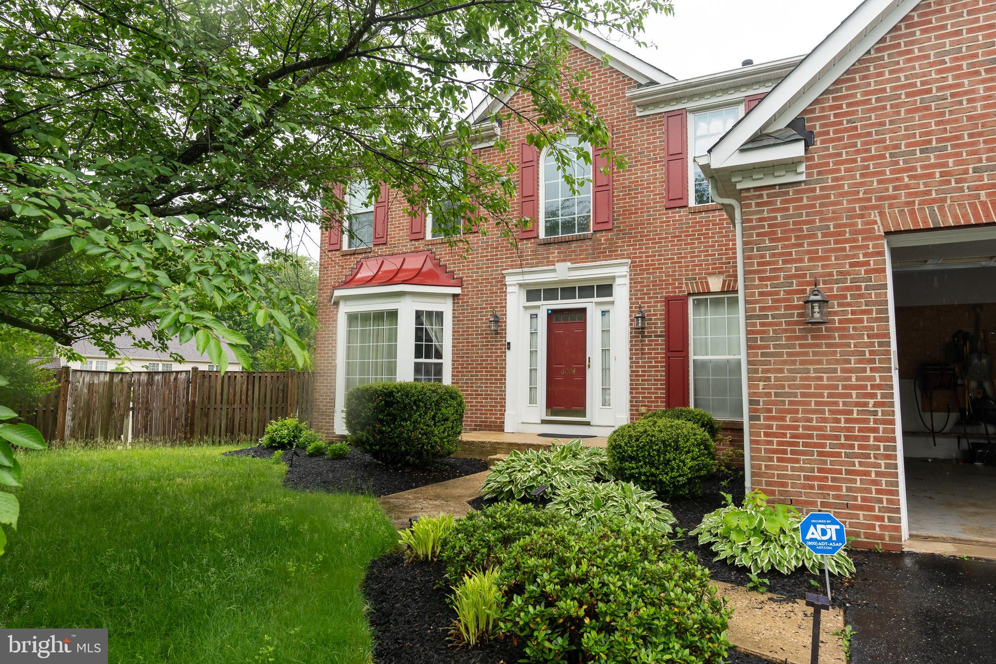 Welcome to this beautifully maintained 4 bedroom, 3.5 bathroom home on a quiet cul-de-sac, backing to a bike trail with access to D.C. and Bowie State. The main level features LVP flooring, a spacious family room with gas fireplace and mounted TV (conveys), formal living and dining rooms, and an updated kitchen with stainless steel appliances (gas stove, microwave and dishwasher), pantry, and plenty of cabinet space. Laundry room includes washer/dryer, shelving, and access to a 2-car garage. 

Upstairs, the primary suite includes a walk-in closet with shelving, ceiling fan, and en suite bath with double vanity, separate tub and shower. Three additional bedrooms share a hall bath with double vanity. 

The finished basement offers LVP and carpeted flooring, a second living area with mounted TV, full wet bar with fridge, microwave, and sink, full bath, and ample storage. The fully fenced backyard features a deck, pergola, shed, outdoor table, and lawn tractor (all can convey). Security system included. 

Located minutes from a splash park and in a prime commuting location. This home combines comfort, space, and location- perfect for daily living and entertaining. Schedule your showing today!
