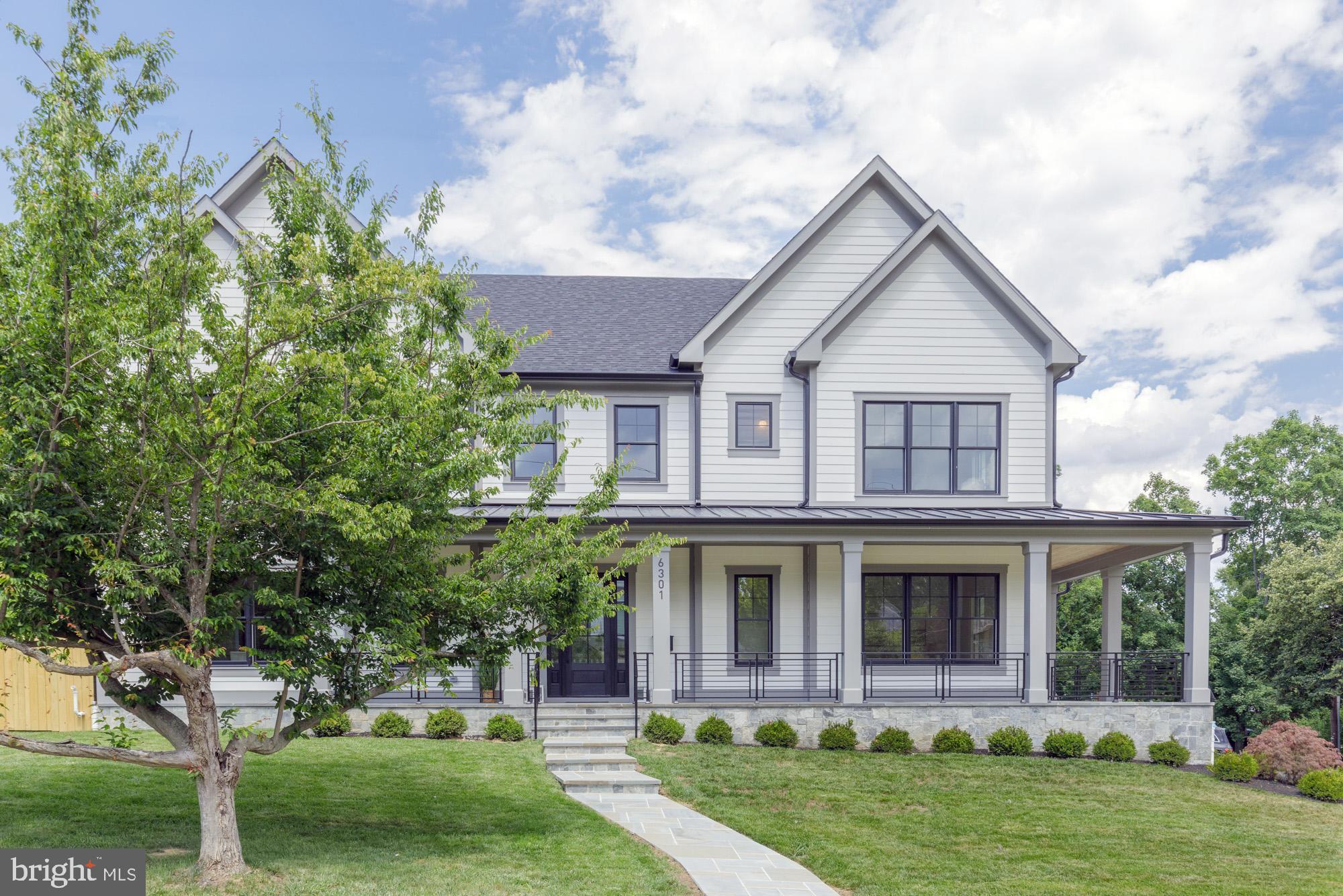 *** Open House this Saturday 6/27, 2:00PM - 4:00PM. Be the first in to see this amazing NEW CONSTRUCTION - move in ready for summer! *** RARE CORNER LOT with a Fully Wrapped Front Porch & Hidden Side-Entry Garage!***.   Experience the ease of new construction paired with luxury and functionality. Designed for both everyday living and effortless entertaining, the heart of the home has a stunning gourmet kitchen featuring an oversized center island, expansive cabinetry, and seamless flow to both casual and formal dining spaces. A sophisticated butler's pantry, oversized walk-in pantry, and spacious mudroom add exceptional convenience.

A sun-filled two-story foyer creates a grand first impression, leading to four generously sized upper-level bedrooms, each with its own private en-suite bath. The luxurious owner's retreat is a true sanctuary, complete with dual walk-in closets, an elegant tray ceiling, designer chandelier, and a spa-inspired bath featuring separate vanities, a soaking tub, and a glass-enclosed shower.

The finished lower level offers incredible flexibility with a private guest suite, a mirrored fitness studio with turf flooring, and an expansive recreation room with a kitchenette/bar area—perfect for entertaining, multigenerational living, work-from-home needs, or hobby space.

Nestled within the private enclave of Merrimack Park, this exceptional home offers easy access throughout the DMV while remaining just minutes from shopping, dining, and entertainment destinations of Westbard and Bethesda Row.

Luxury. Location. Lifestyle. This is the one you've been waiting for.   WHITMAN CLUSTER SCHOOLS