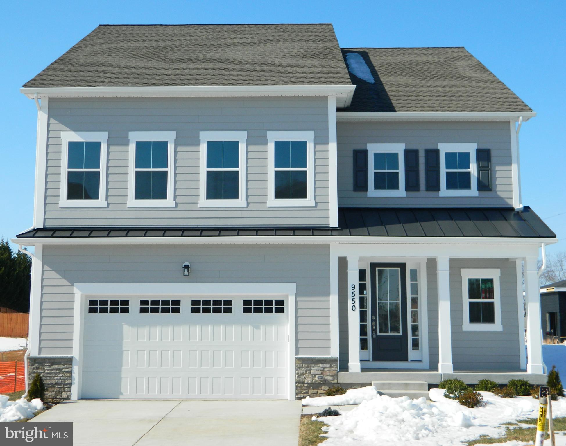 UPDATE - PRICE DROP! - BRAND NEW HOME IS 100% COMPLETE AND MOVE IN READY - Introducing the “Allison” model at Jefferson Square, an exceptional new construction home built by Highland Homes.  Offering more than 3,200 square feet of beautifully designed living space all within a half mile of vibrant Old Town Manassas.  From the moment you arrive, timeless exterior selections stand out with a natural stone water table and Hardie Plank siding that wrap around the entire home. These materials were chosen for both elegance and long-term durability, setting the tone for what lies inside.  Once you enter the home you will see how the tall 9-foot ceilings and upgraded windows create a bright, open atmosphere that enhances the architect designed main level. The kitchen is the heart of the home, featuring quartz countertops, an oversized island with built-in dishwasher, full custom cabinetry, and premium KitchenAid appliances, a perfect blend of style and functionality for everyday living or entertaining.  Up the oak stairs, you’ll find five well-proportioned bedrooms, three full bathrooms, and a dedicated walk-in laundry room. The primary suite offers dual walk-in closets and a spa-inspired en-suite bath with premium finishes. The additional bedrooms provide excellent space and natural light, while the two secondary bathrooms continue the home’s upscale aesthetic with quartz-topped vanities, contemporary lighting, and sleek fixtures.  Location is a major highlight of this property. A dedicated bike lane and sidewalk provide a direct link to Old Town Manassas, known for its family-friendly festivals, boutique shops, popular restaurants, live entertainment, and even an outdoor ice rink. Commuters and travelers will appreciate being just a half mile from the VRE station. Residents of Jefferson Square also enjoy access to a large private courtyard with a playground, firepit, and community garden, all maintained by its HOA. With its premium upgrades, thoughtful design, and desirable location, this home offers a rare opportunity to own a truly one-of-a-kind property.