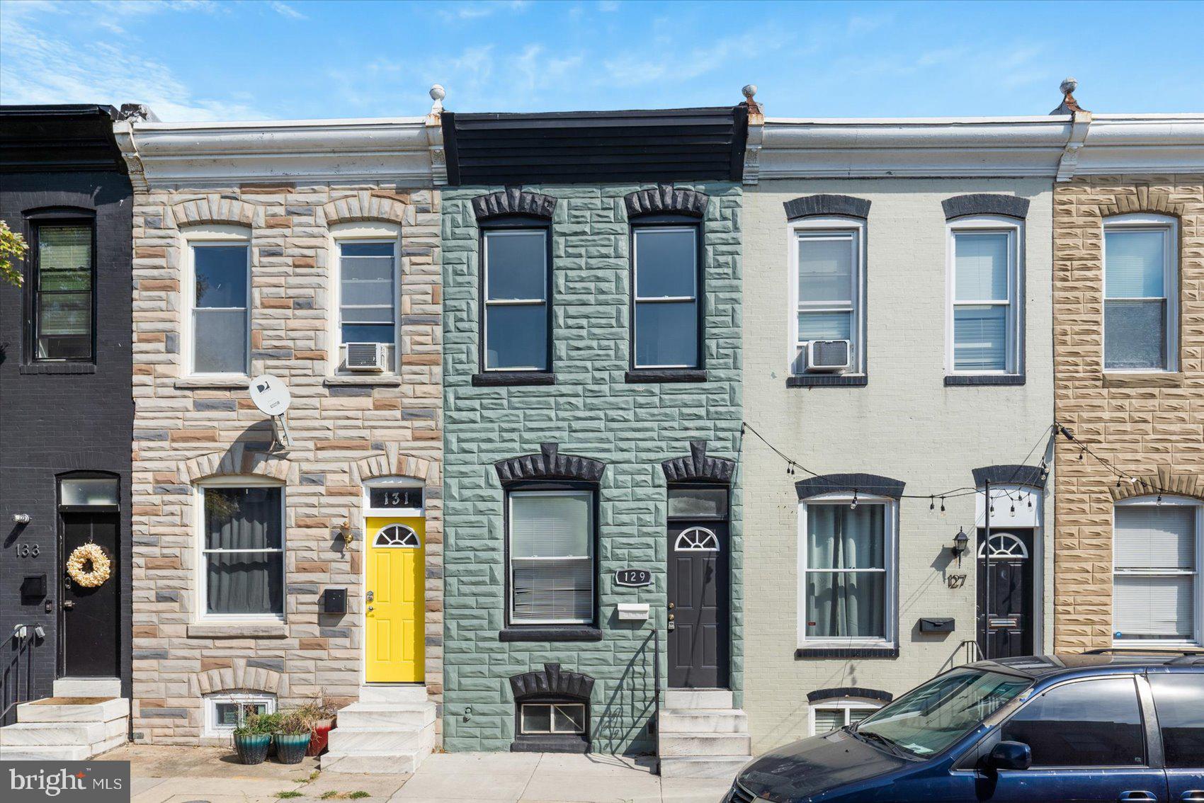 Beautiful renovation, just 2 blocks from Patterson Park, that offers what everyone wants in Baltimore City Living - A ROOFTOP DECK.  Huge deck with 360 degrees views of Patterson Park and the city.  This 2 Bedroom 1.5 bath home features custom details including Tray Ceilings and Wainscoting through out the first floor.  Hardwood floors with an Open floor plan leads you to your new Kitchen featuring granite counters, black appliances and plenty of cabinet space.  Brand new Luxury vinyl flooring installed in the Kitchen and second floor.  Big, back yard with privacy fence that is perfect for cookouts and entertaining.  City Living at its very Best!  For an additional $50 per month, Owner will install a Murphy Bed that can be used as a desk and opened up to be used as an extra bed for guests