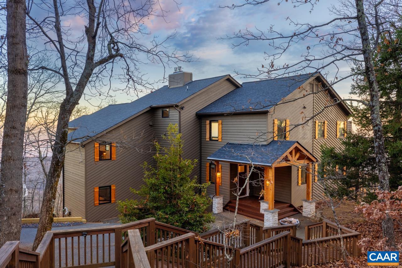 Stunning views, Stunning location and a Stunning home. This is the Wintergreen trifecta! Stand on one of the many decks and immediately find yourself mesmerized and speechless at the magnificent beauty of the mountain and valley vistas visible from the East across the Piedmont with views of the Resort and Ski slopes and finally stretching across the coveted long range mountain views to the South with a finishing touch of Three Ridges to the Southwest. Arguably one of the top views to be found at a home in Wintergreen. This home has been renovated and remodeled with exquisite attention to detail, restoring it to even better than its former glory as a Post-Modern architectural masterpiece. Views from virtually all windows, and every bedroom opens to a deck and to The View. This is a must see! Too many features to list. Versatility, function and comfort combine to enable your family and guests to experience the best of Mountain Living and the Wintergreen Lifestyle. The views will last an eternity, the opportunity won't.,Quartz Counter,White Cabinets,Fireplace in Great Room,Fireplace in Master Bedroom