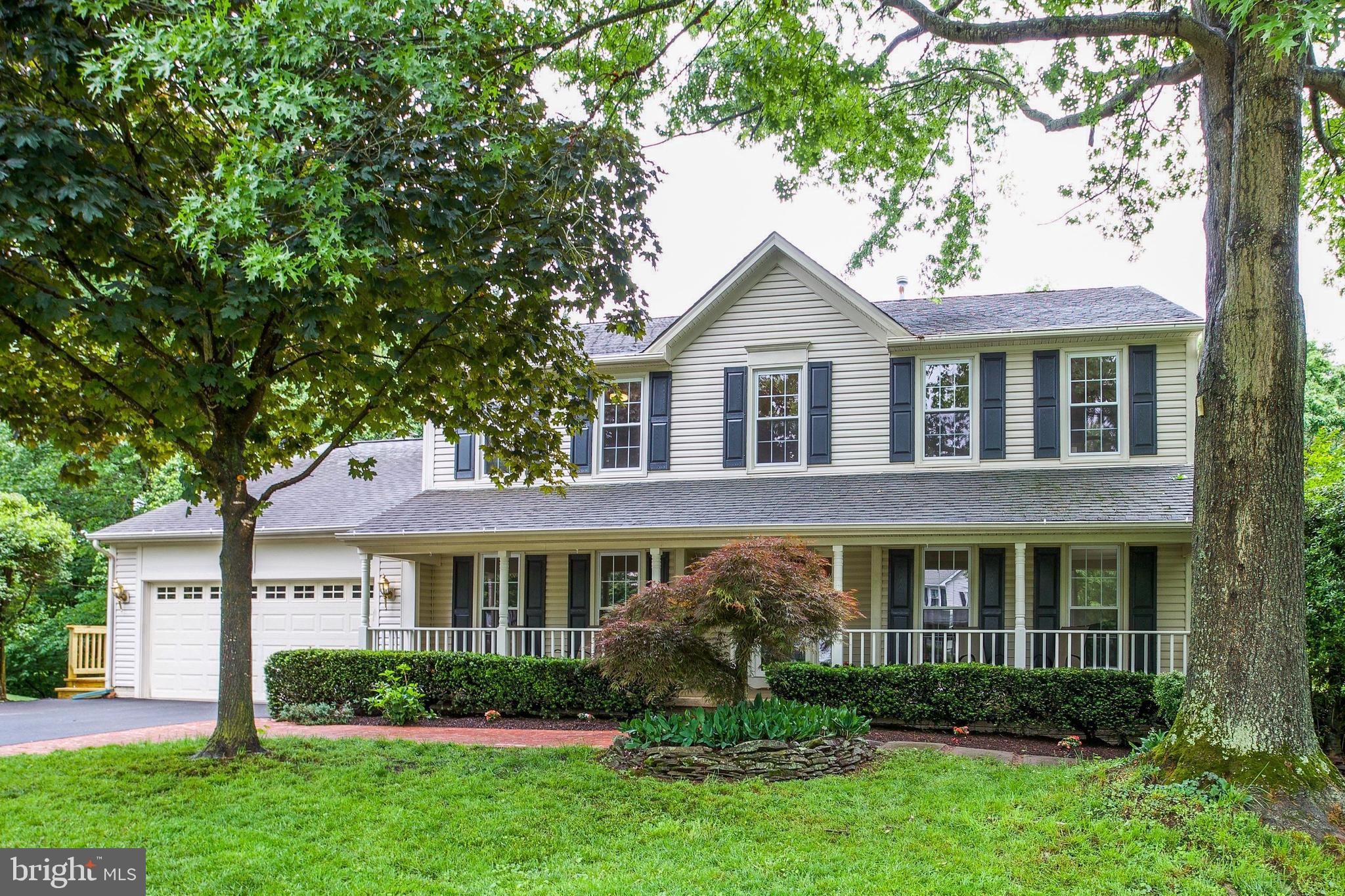 Ready for a tranquil setting? This front-porch colonial is set on a cul-de-sac and backs to the dedicated woods that the actual Little Rocky Run, which the community is named for, meanders through! Enjoy the year 'round ambient "babbling brook" sounds while relaxing on the brand-new sun deck or large brick Patio. Progressively-designed interior floor plan flows easily from room to room! Bright & airy with 2-levels of light hardwoods, tall windows & high ceilings that let the natural light pour in! Smartly modernized Kitchen offers a center island AND peninsula island with counter bar for abundance of counter space! Rare walk-in Pantry and, of course, quality granite & stainless. Newly renovated Master & hall Baths! Massive finished Lower Level, with walk-out to Patio, has a Great Room, Kitchenette, Den/Guest Bedroom & full Bath. Here's a Home worth putting down roots-popular community is close to schools, retail and offers great recreation.