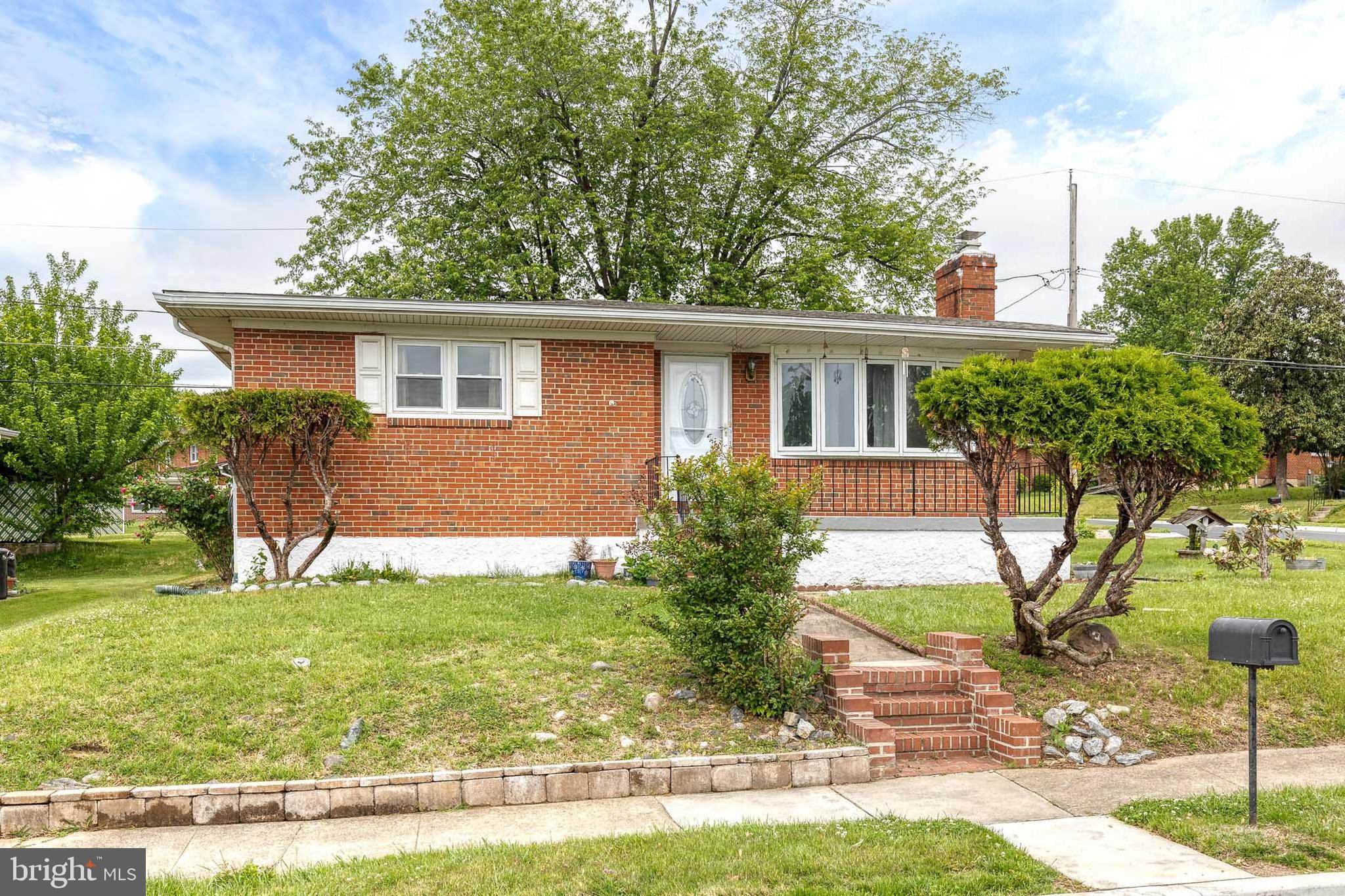 A charming 2-bedroom, 1.5-bathroom bungalow in the heart of Rosedale. An inviting front porch offers the perfect spot to enjoy your morning coffee or unwind after a long day. Step inside to find cozy carpet throughout, with original hardwood floors waiting to shine underneath. The living area is complete with a fireplace for those cozy evenings and flows into a separate, designated dining room. The dining room, perfect for hosting intimate dinners or festive gatherings, opens directly to the kitchen, creating a practical and welcoming layout for everyday living or entertaining.

Thoughtful updates make this home truly move-in ready: a new roof, hot water heater, HVAC system, and electric panels were all replaced in 2018. The full bathroom was beautifully remodeled in 2019. The partially finished lower level adds incredible flexibility, featuring additional rooms that can easily serve as bedrooms, a home office, gym, or recreation space—tailored to fit your needs.

Out back, you'll love the convenience of a gas line already run to your grill—perfect for hosting summer barbecues or evening gatherings. This home is ready for you to make it your own while enjoying the perfect blend of classic charm and modern comfort.